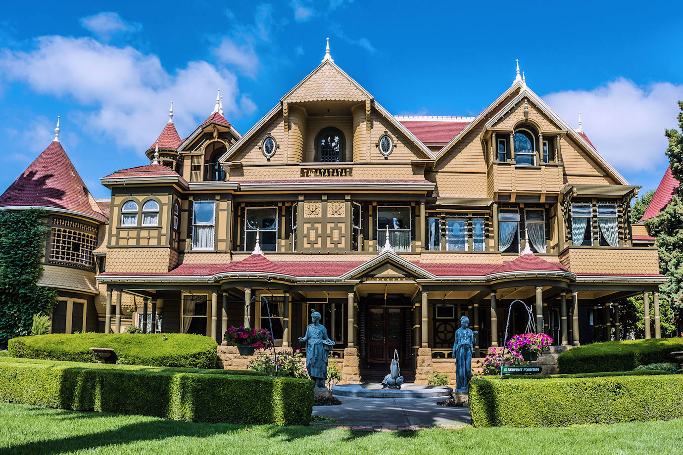 Exterior of the Winchester Mystery House in San Jose, California on a sunny day.