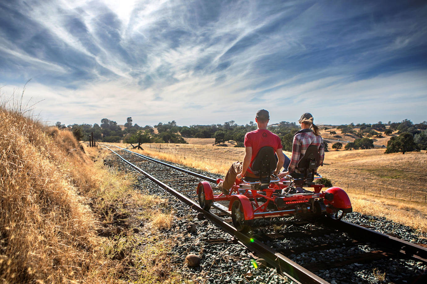 A couple pedal on old railroad tracks with Rail Explorers in Amador County.