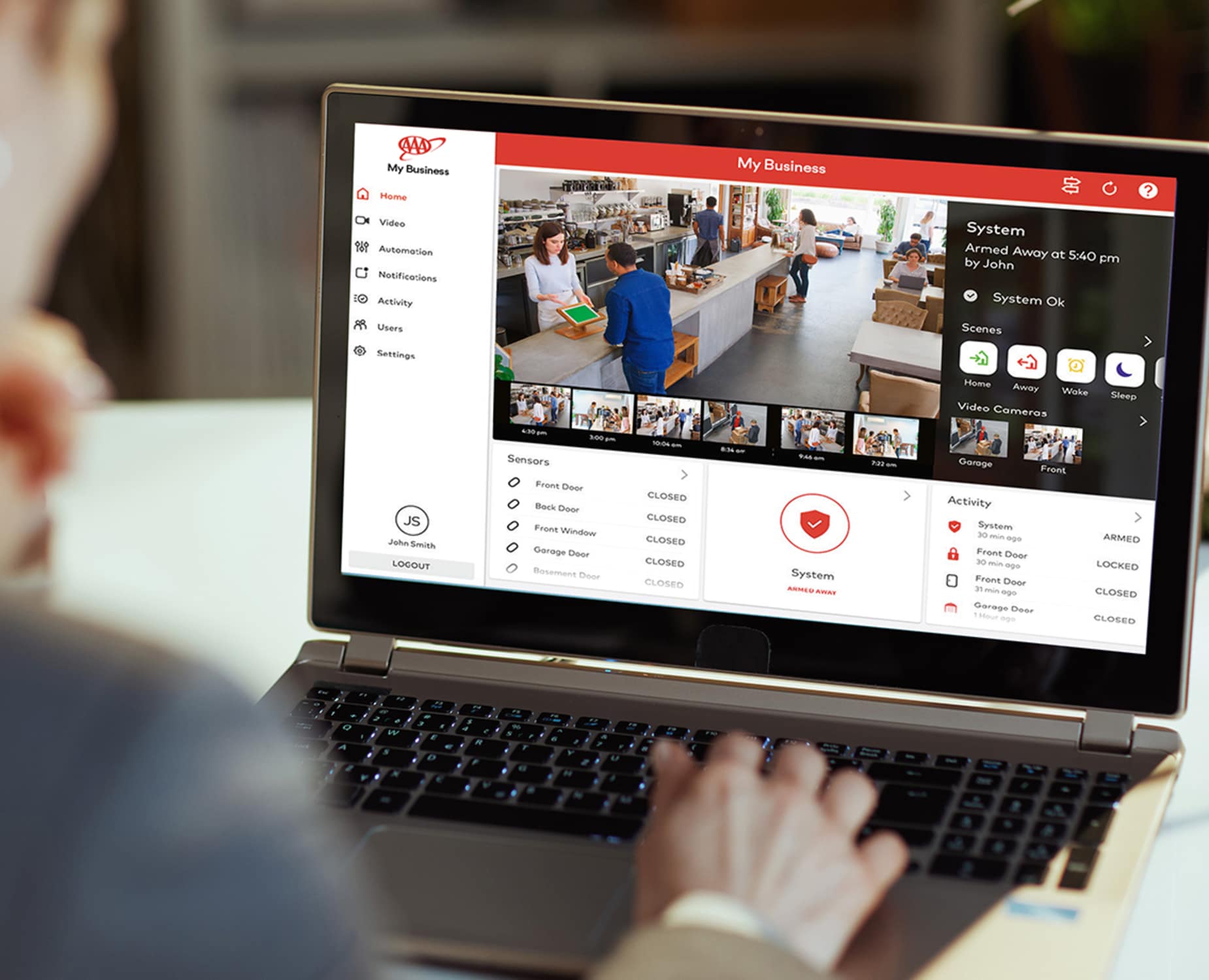 business owner uses video surveillance system from AAA Smart Security 