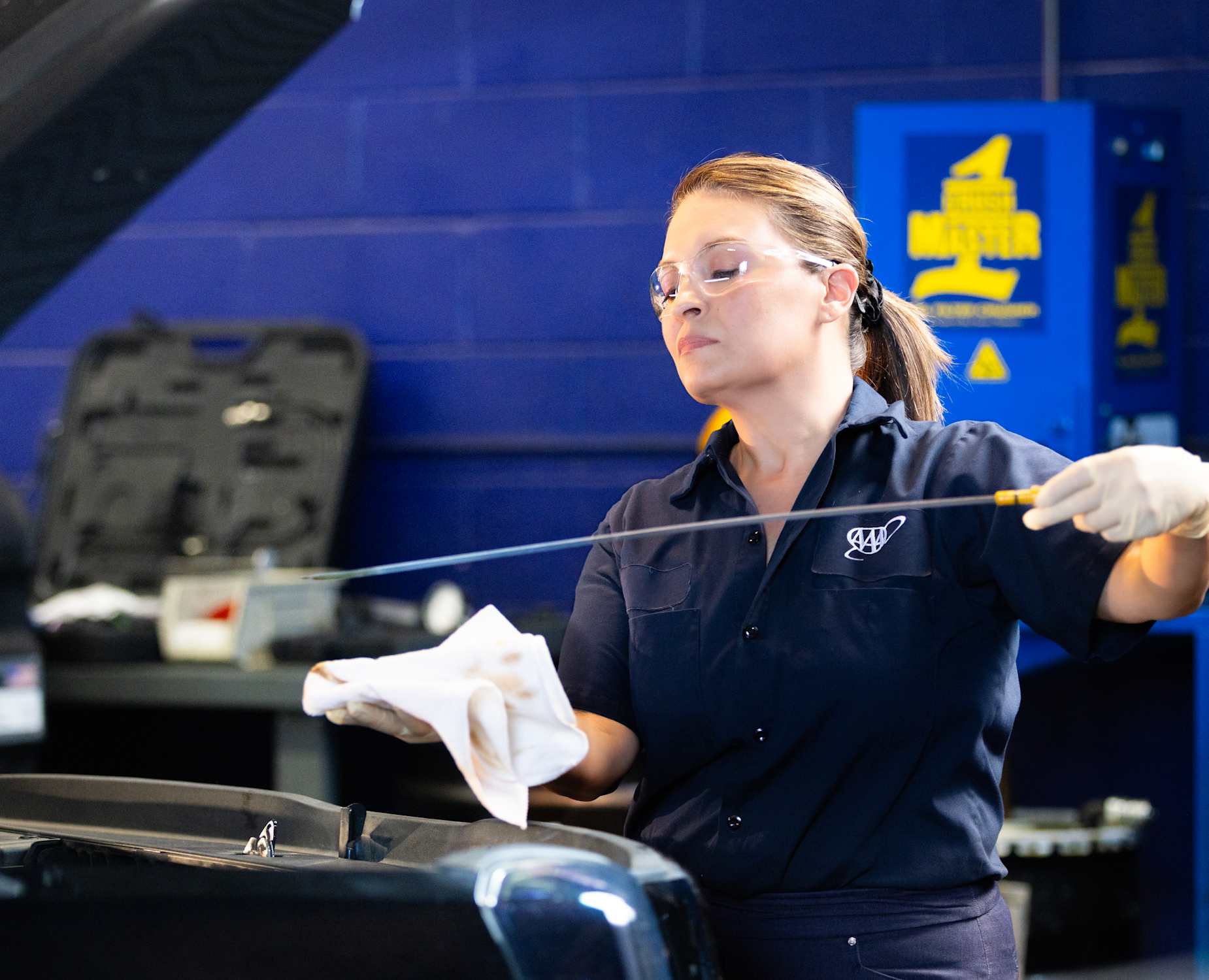 AAA Auto Repair mechanic does a oil change