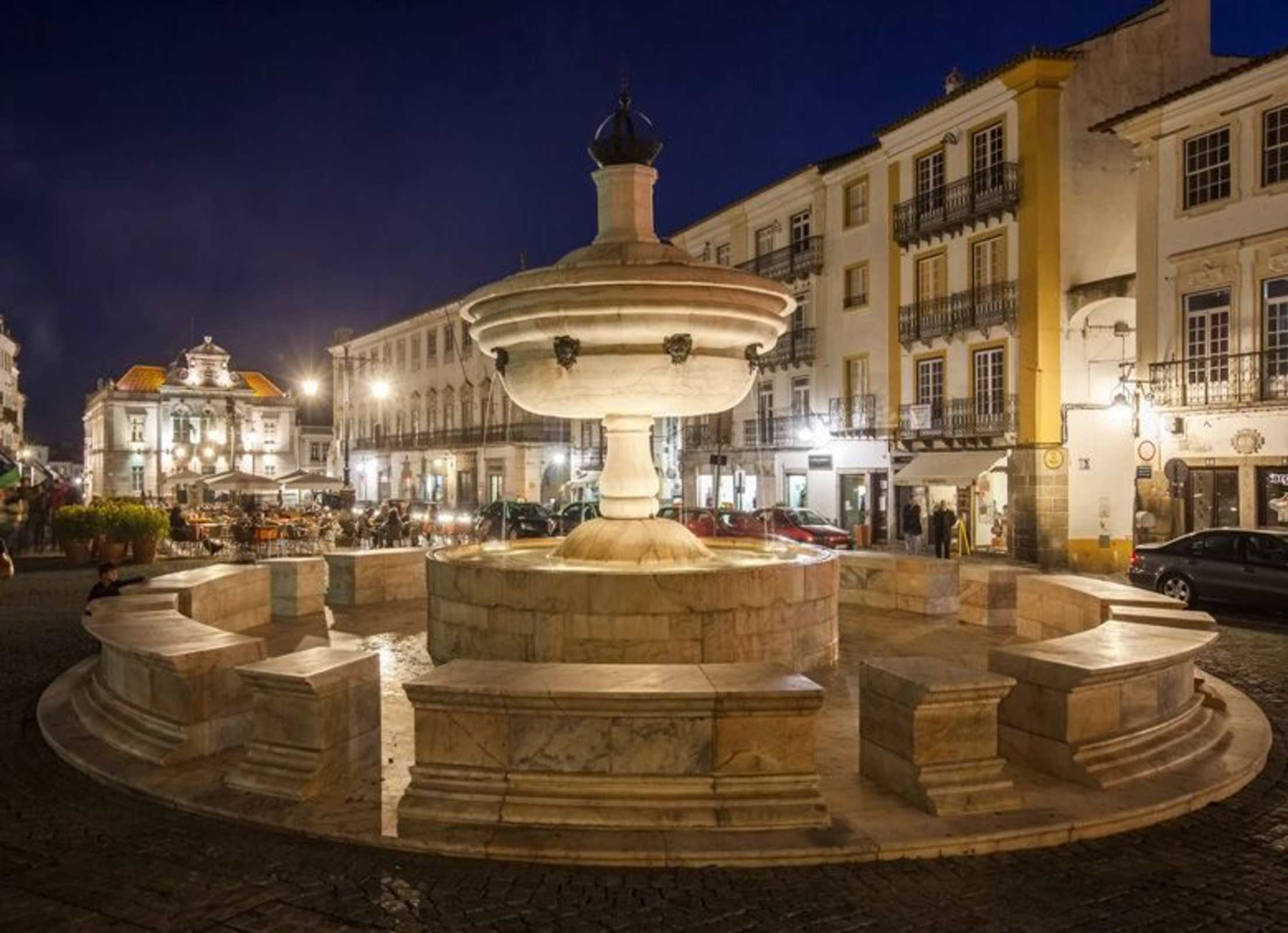 Templo de Diana and sidewalk cafés after dark in Praça do Giraldo, Portugal, picture