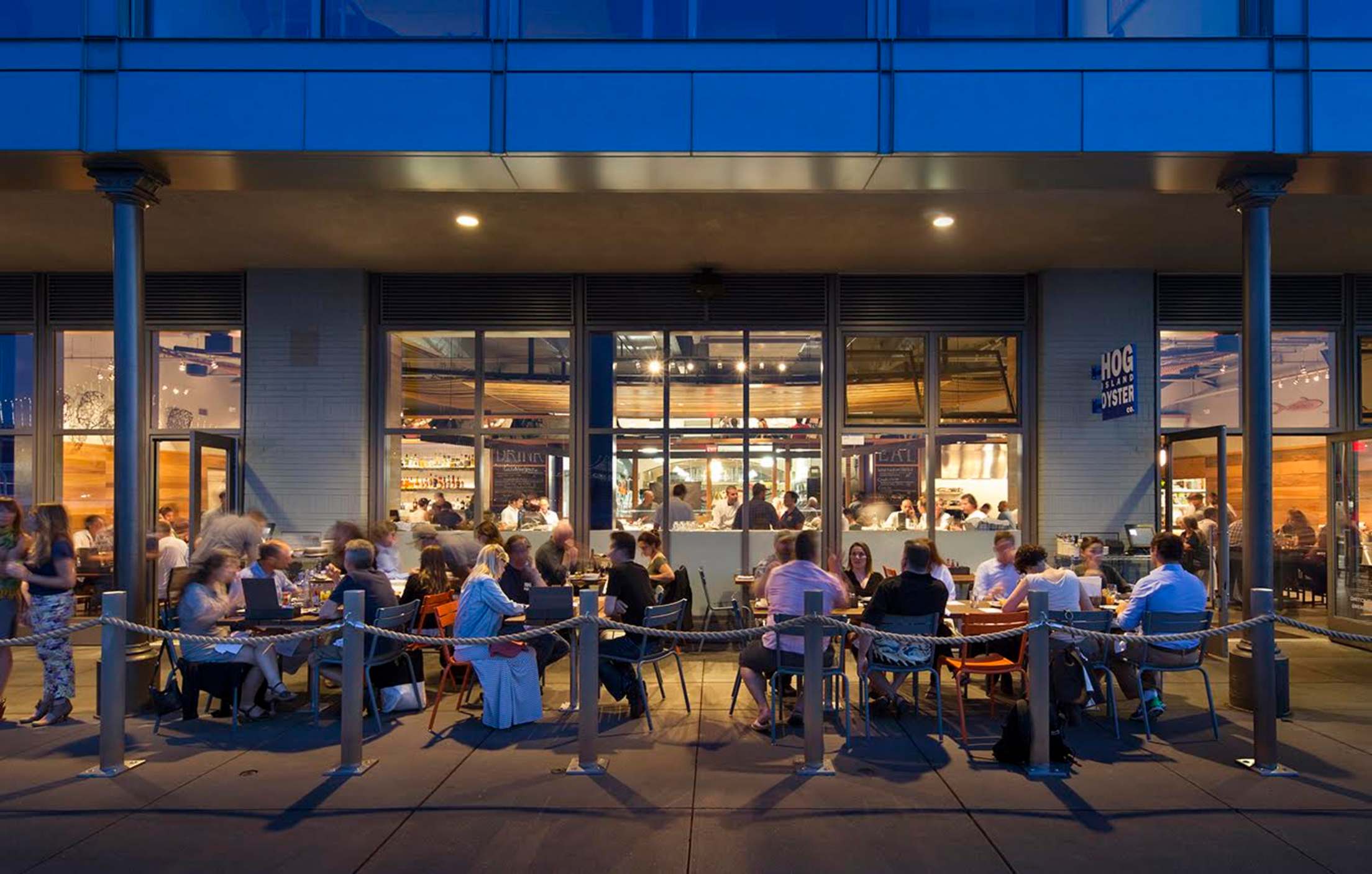 the outdoor seating area at Hog Island Oyster Co. in the San Francisco Ferry Building, picture