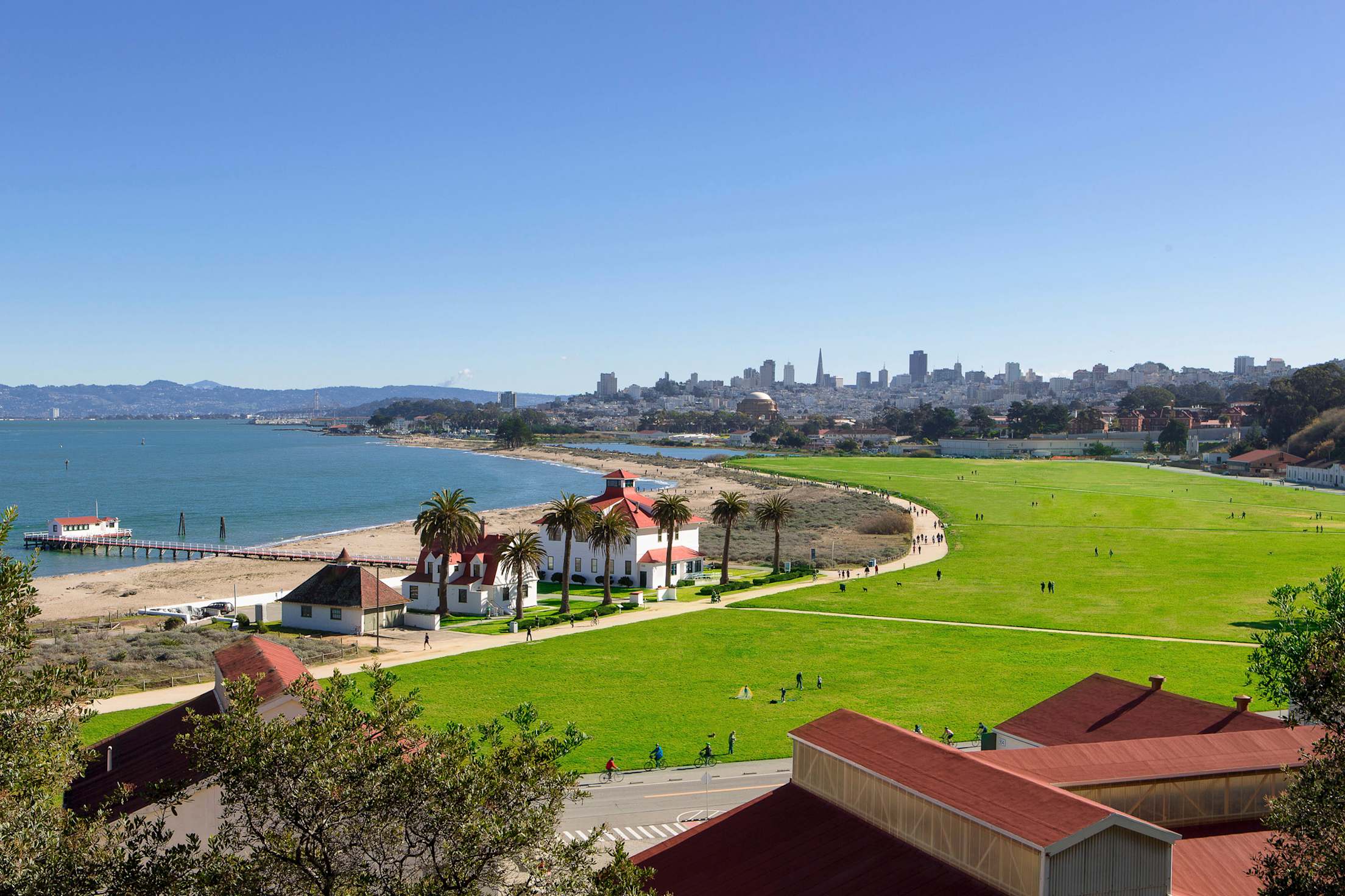 panoramic rooftop view from the Presidio of Crissy Field as it curves to meet San Francisco Bay, picture