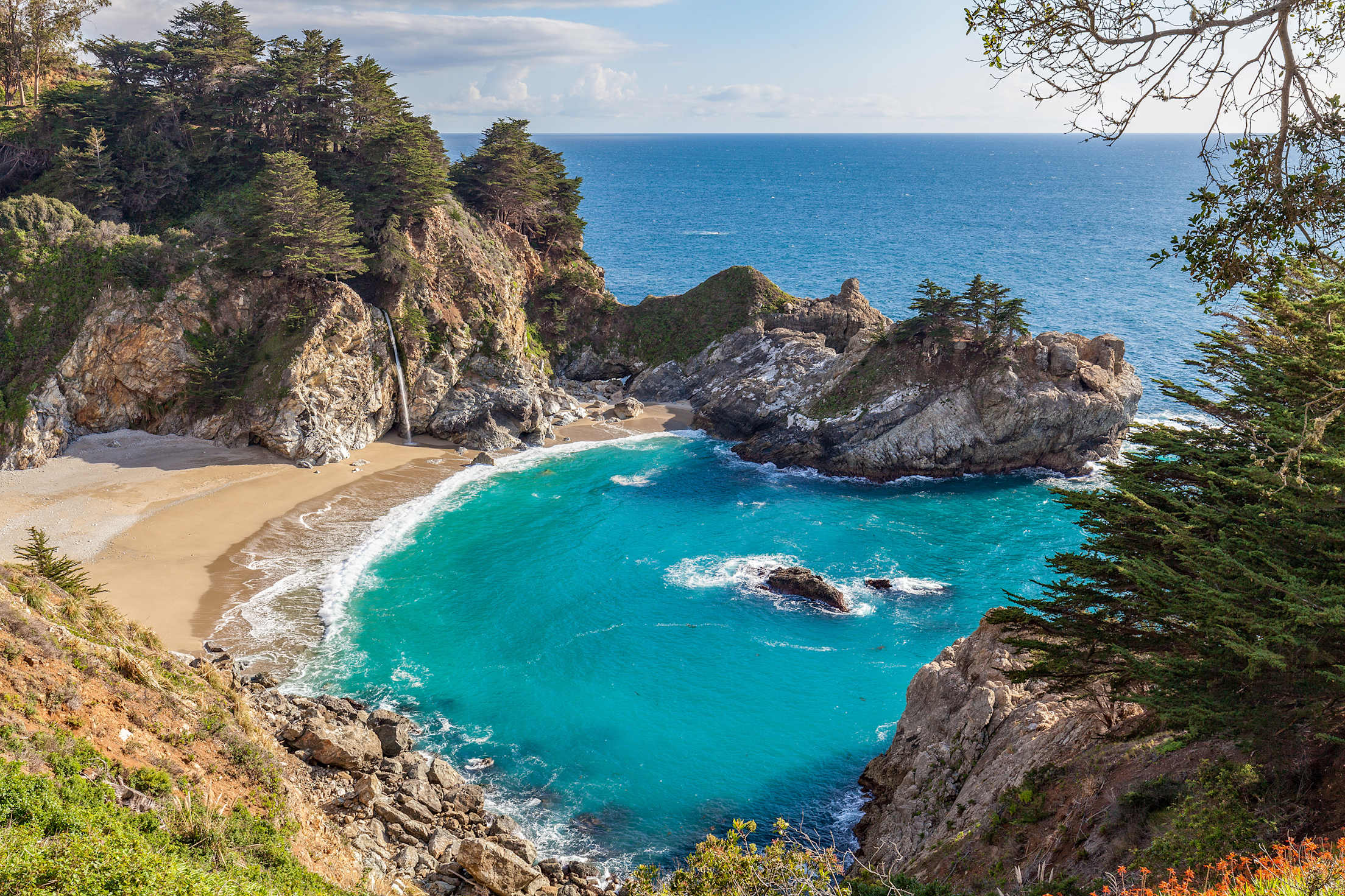 Aerial shot of McWay Falls and the Pacific Ocean in Big Sur, California, picture