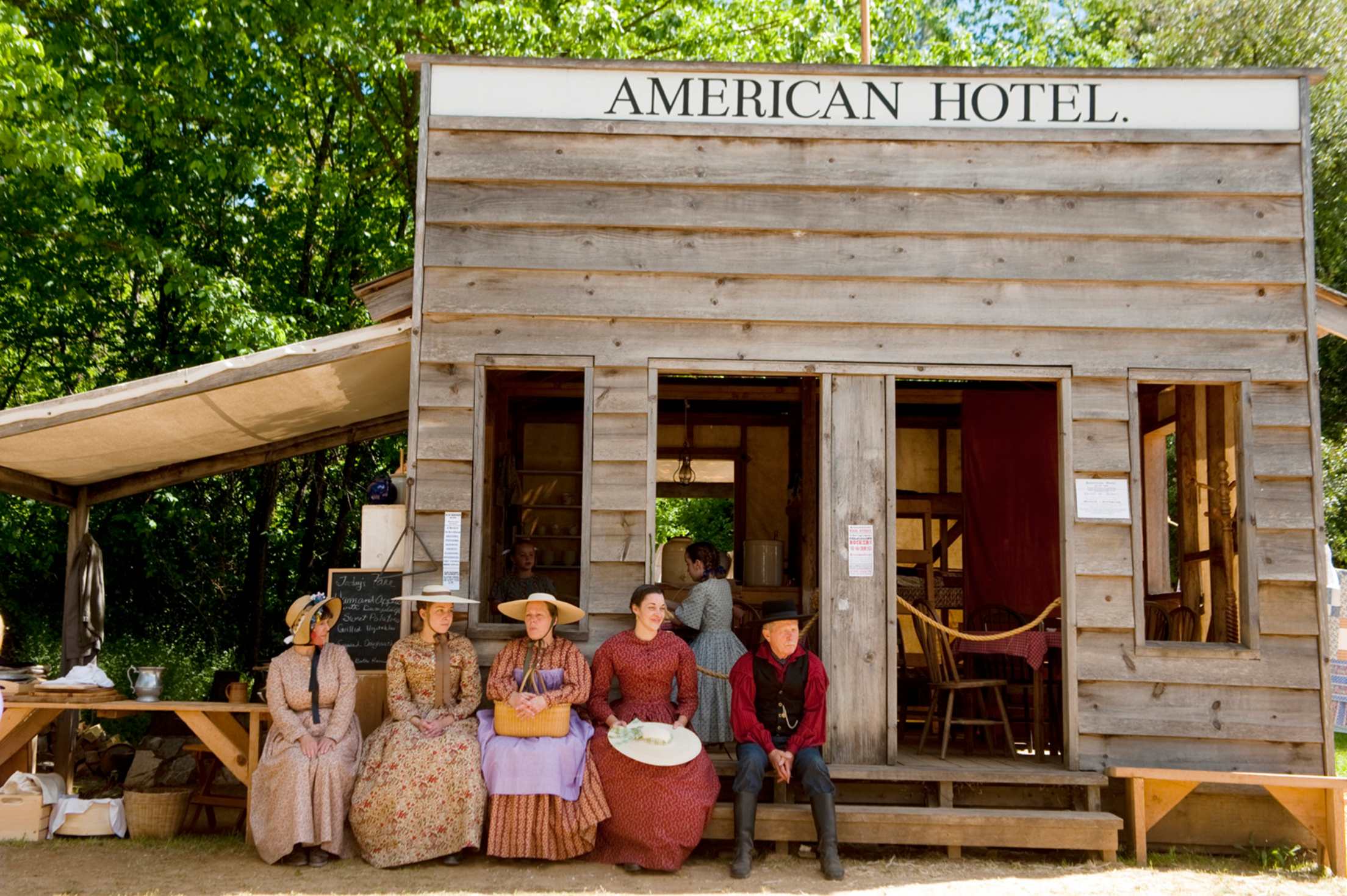 People in period costumes at Columbia State Historic Park, in Gold Country, California, picture