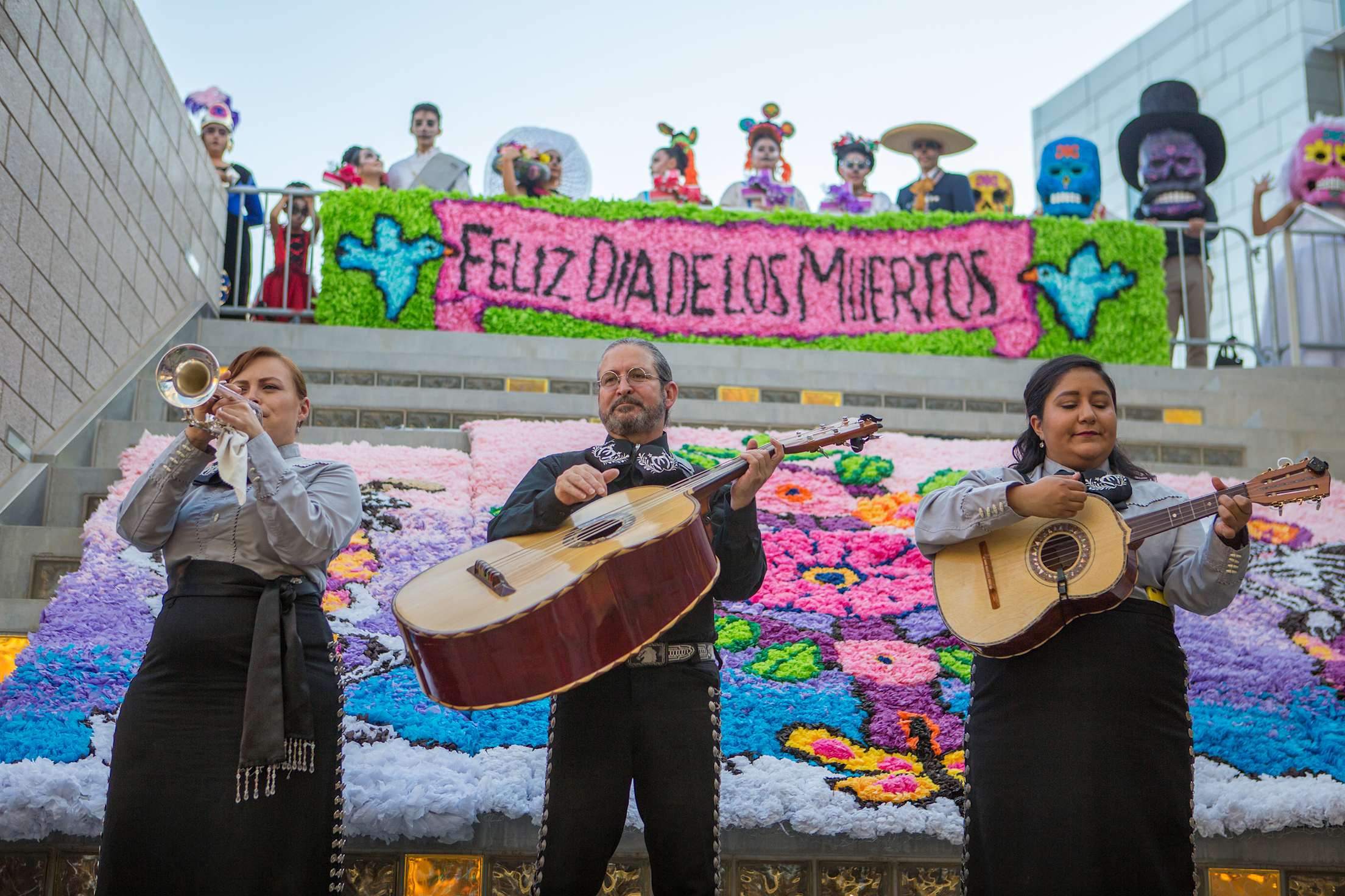 Three mariachi performers at the annual Dia de los Muertos Festival at the Mesa Arts Center in Mesa, Arizona, picture