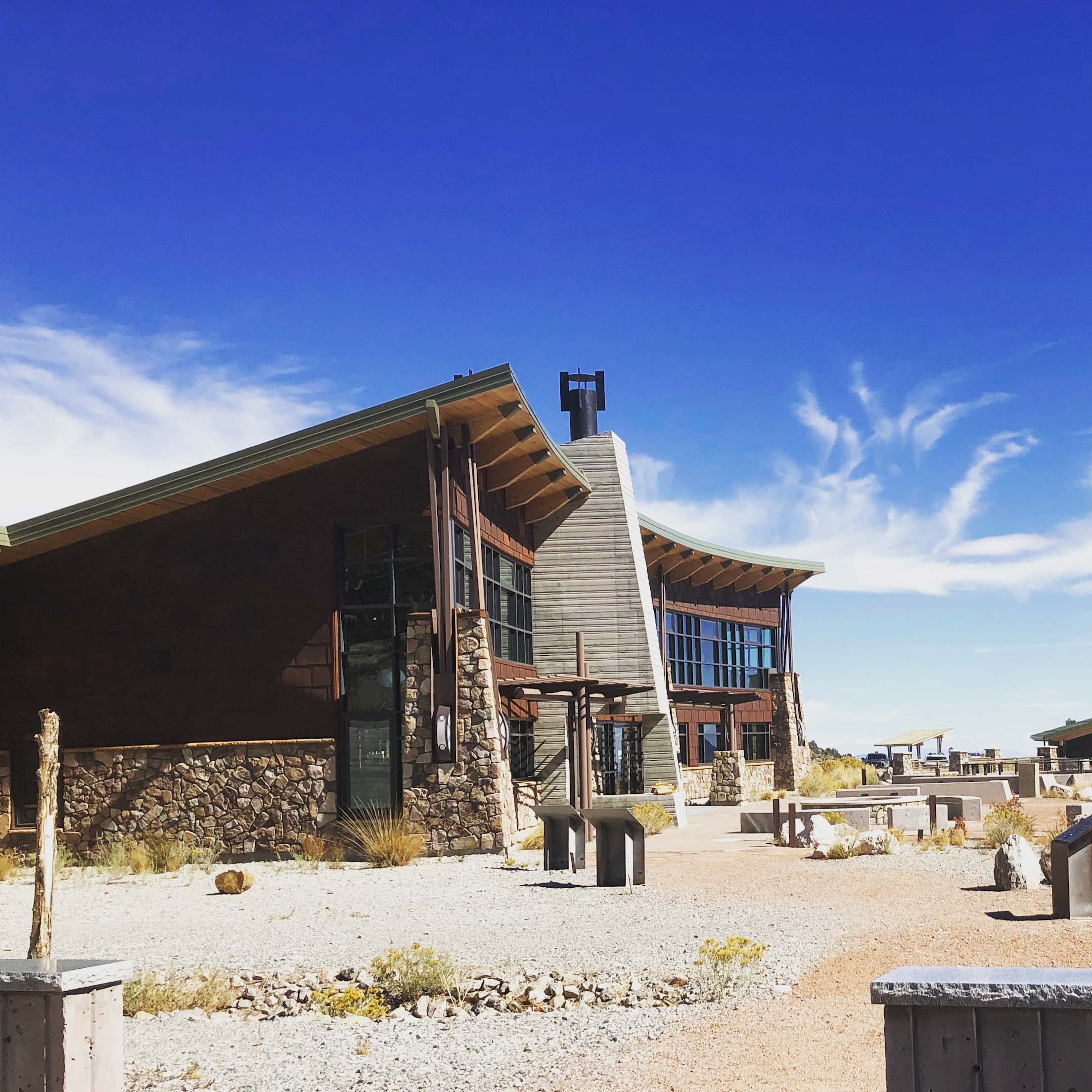 picture of the spring mountain visitors center at mt charleston against a blue sky