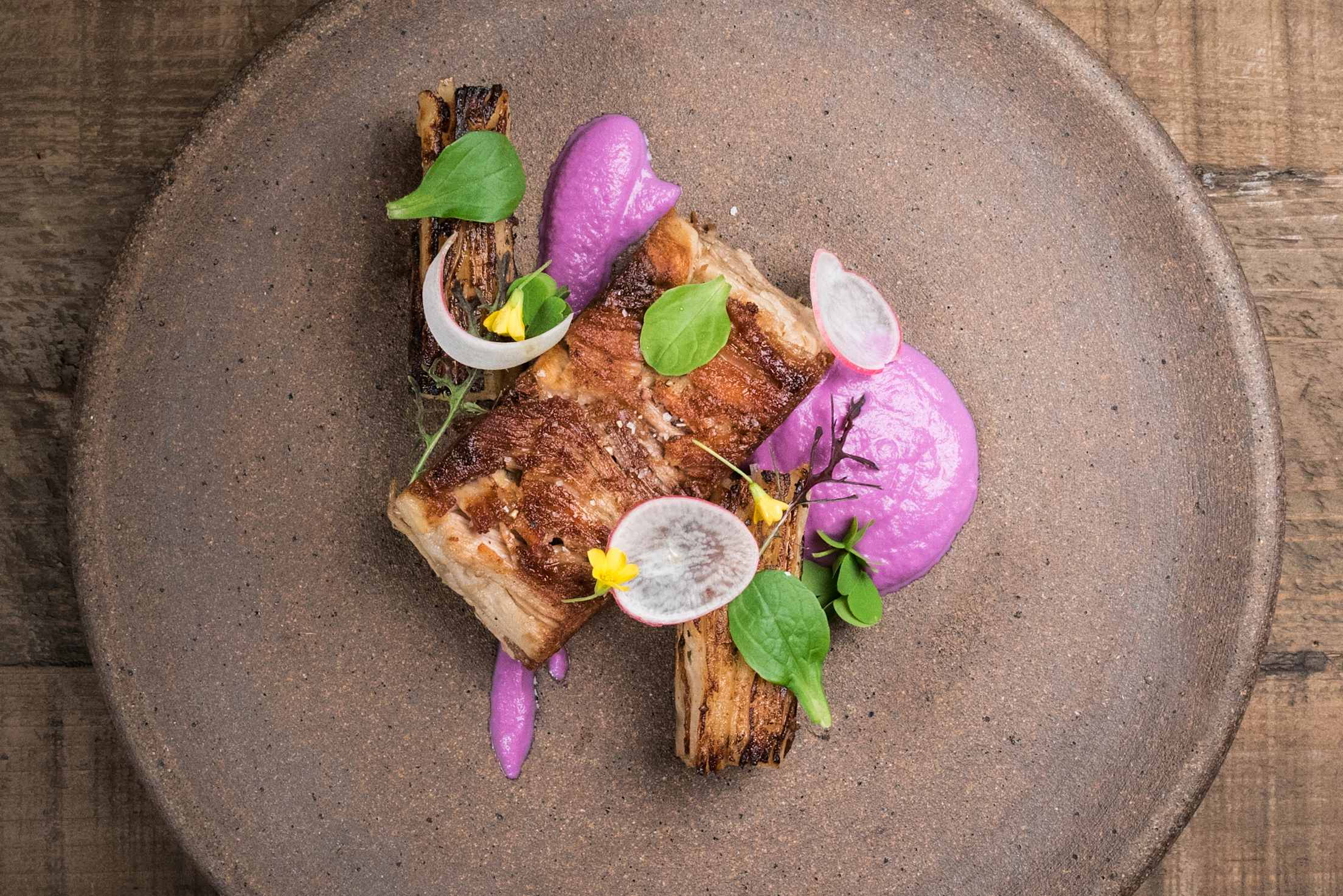 The pork pressé with turnip pavé, red cabbage purée, and radish appeared on Table X’s opening menu in Salt Lake City, photo