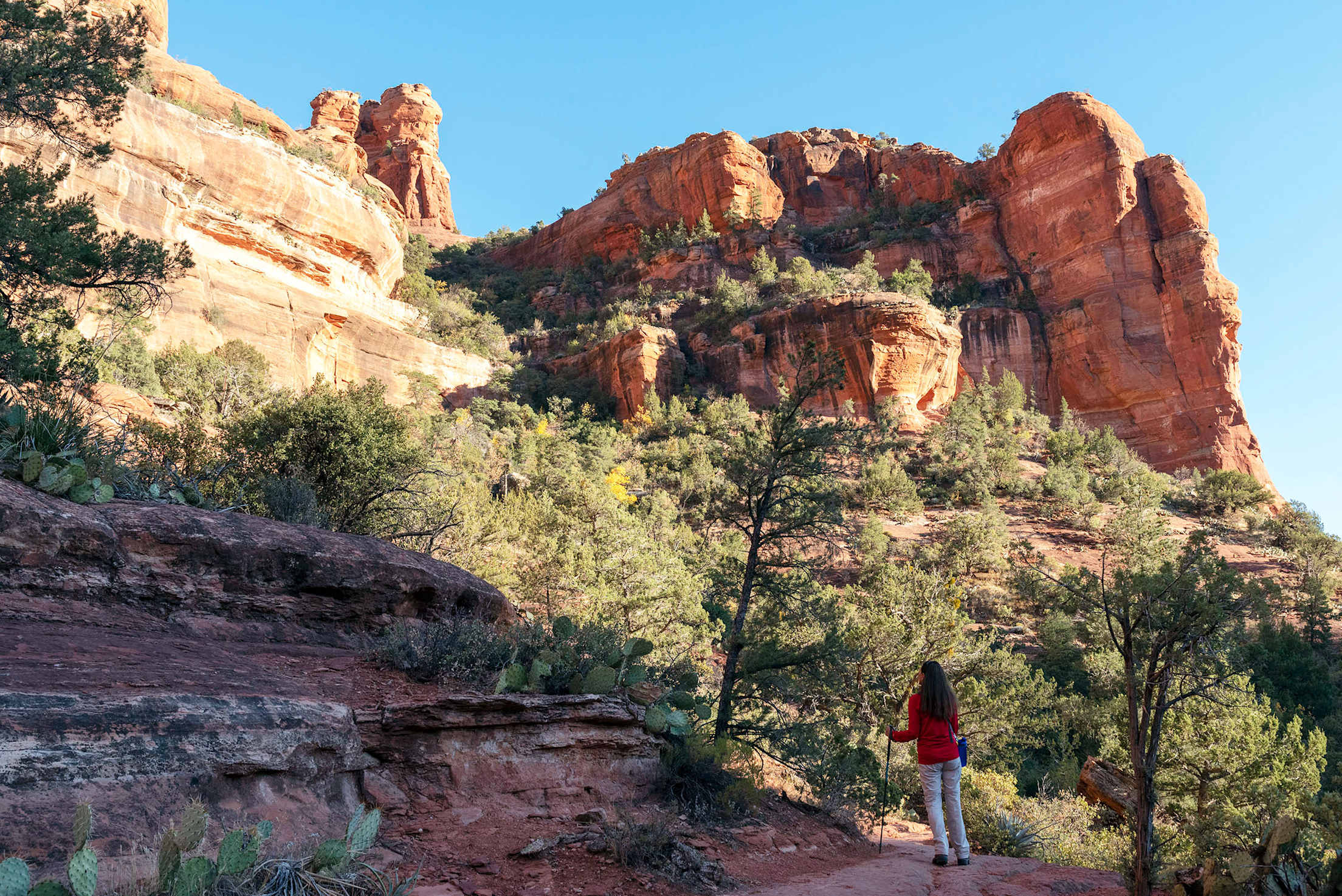 A woman hikes in Boynton Canyon near Sedona, Arizona.