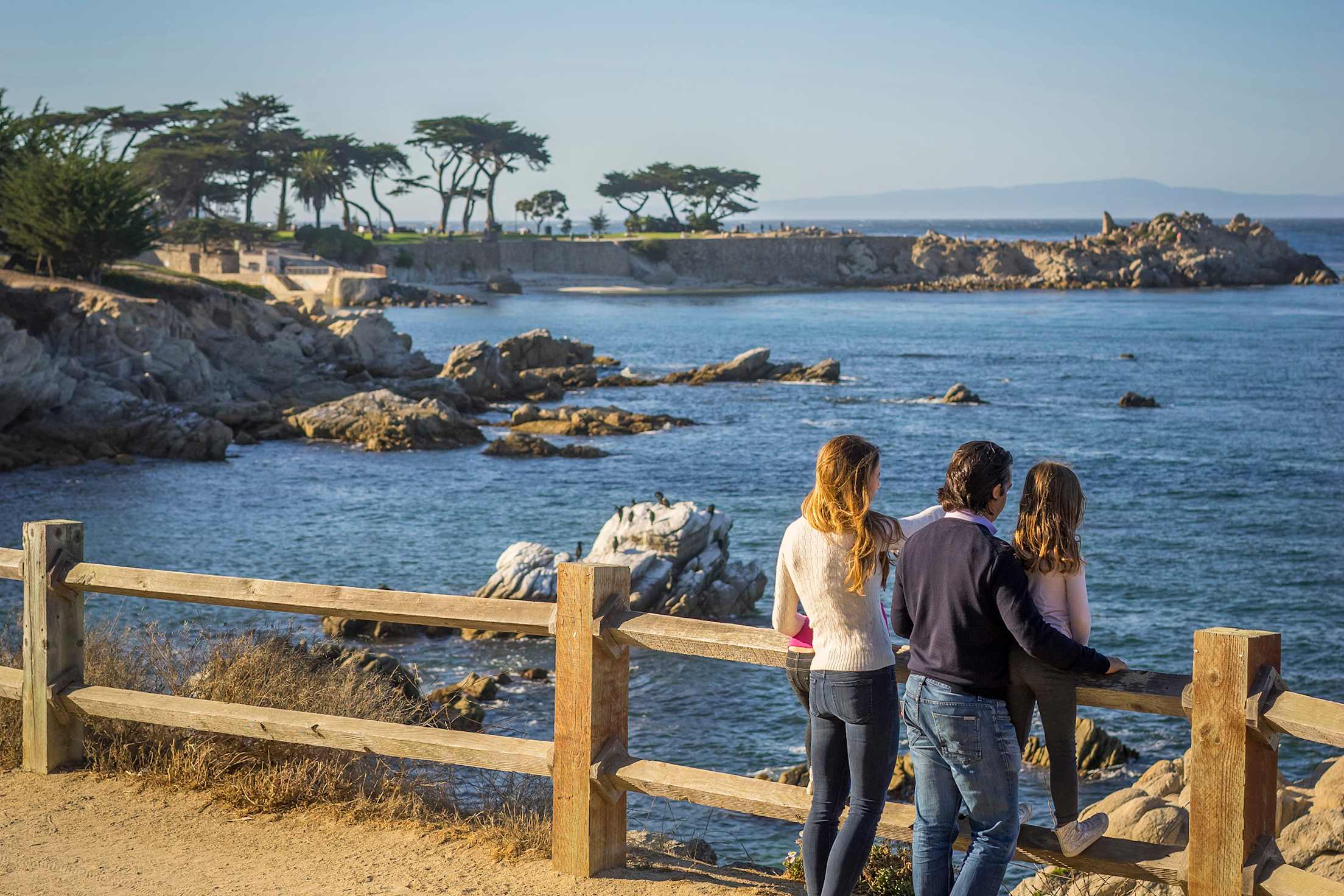 Family look out on Monterey Bay on the Monterey Bay Coastal Recreation Trail, picture