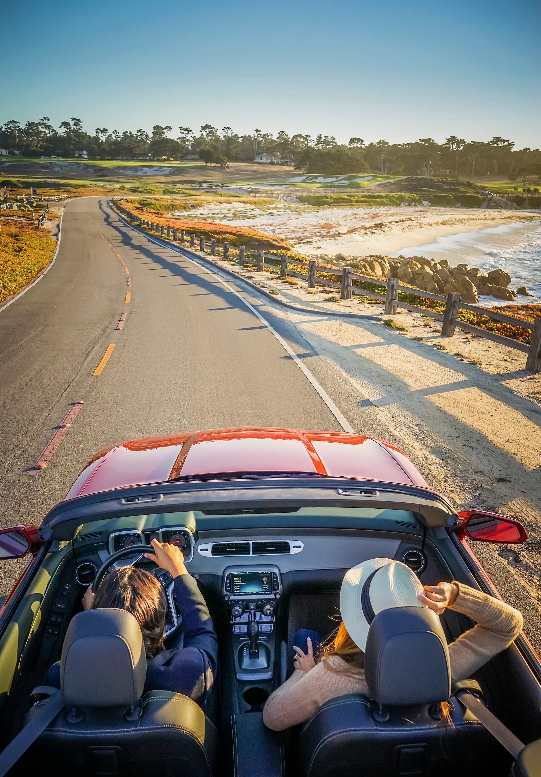 car driving 17-mile drive in Pebble Beach, California, picture