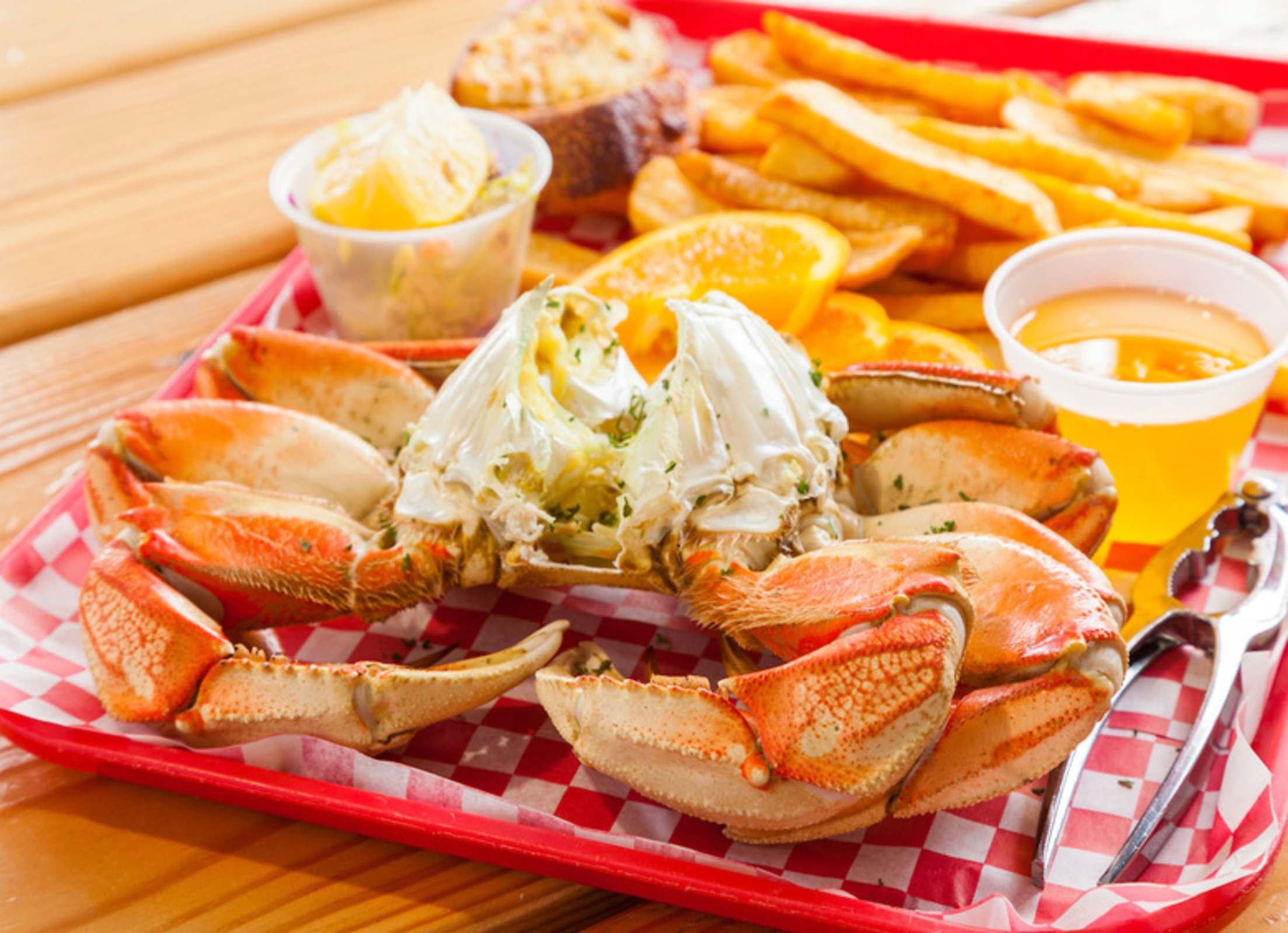 Dungeness crab with drawn butter and fries at Luna Sea Fish House in Yachats, Oregon, picture