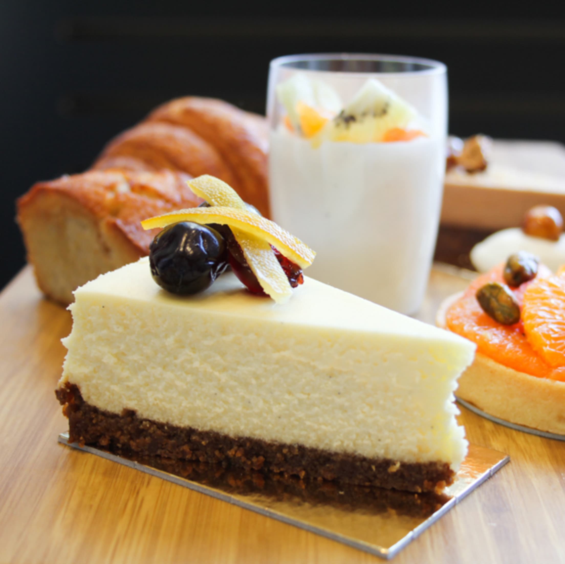 picture of a slice of sour cream cheesecake from The Bake Shop in The Market