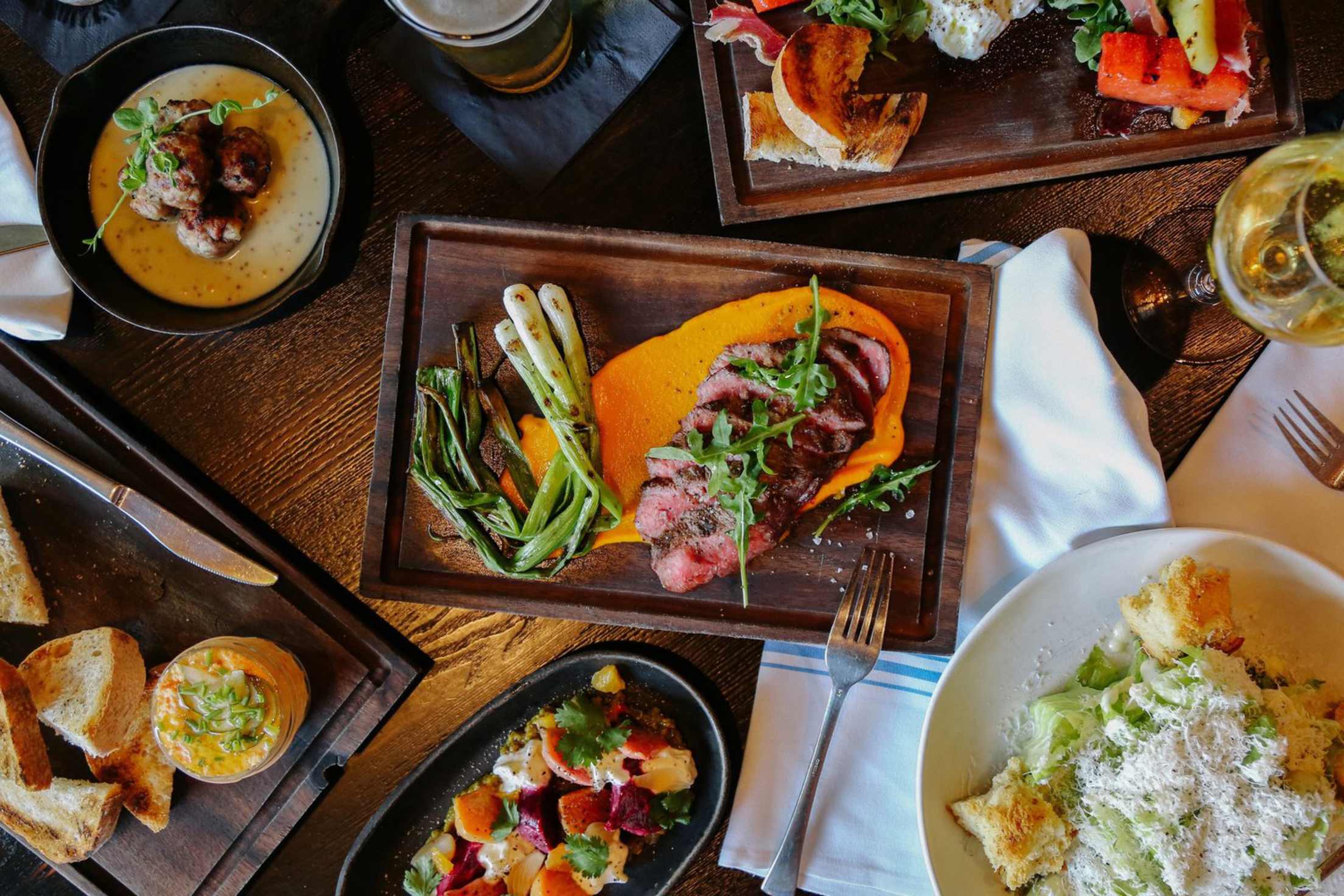 Dishes and drinks on the table at the Hatch, image