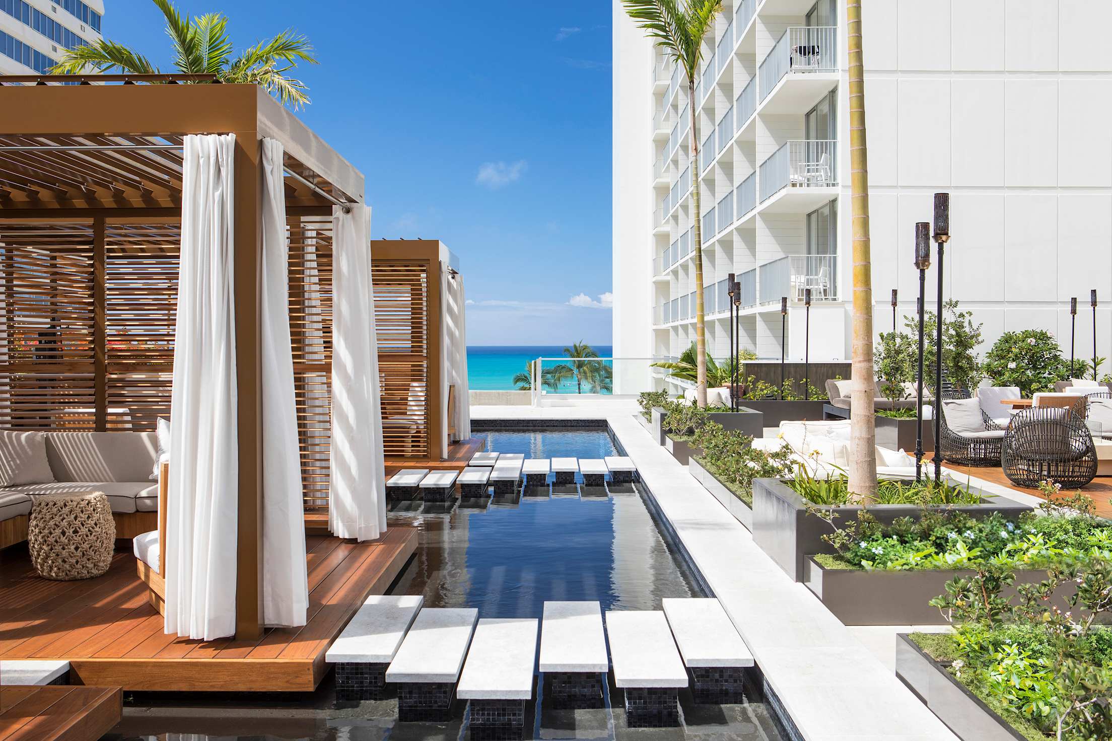 The cabanas at 'Alohilani’s rooftop pool deck, image