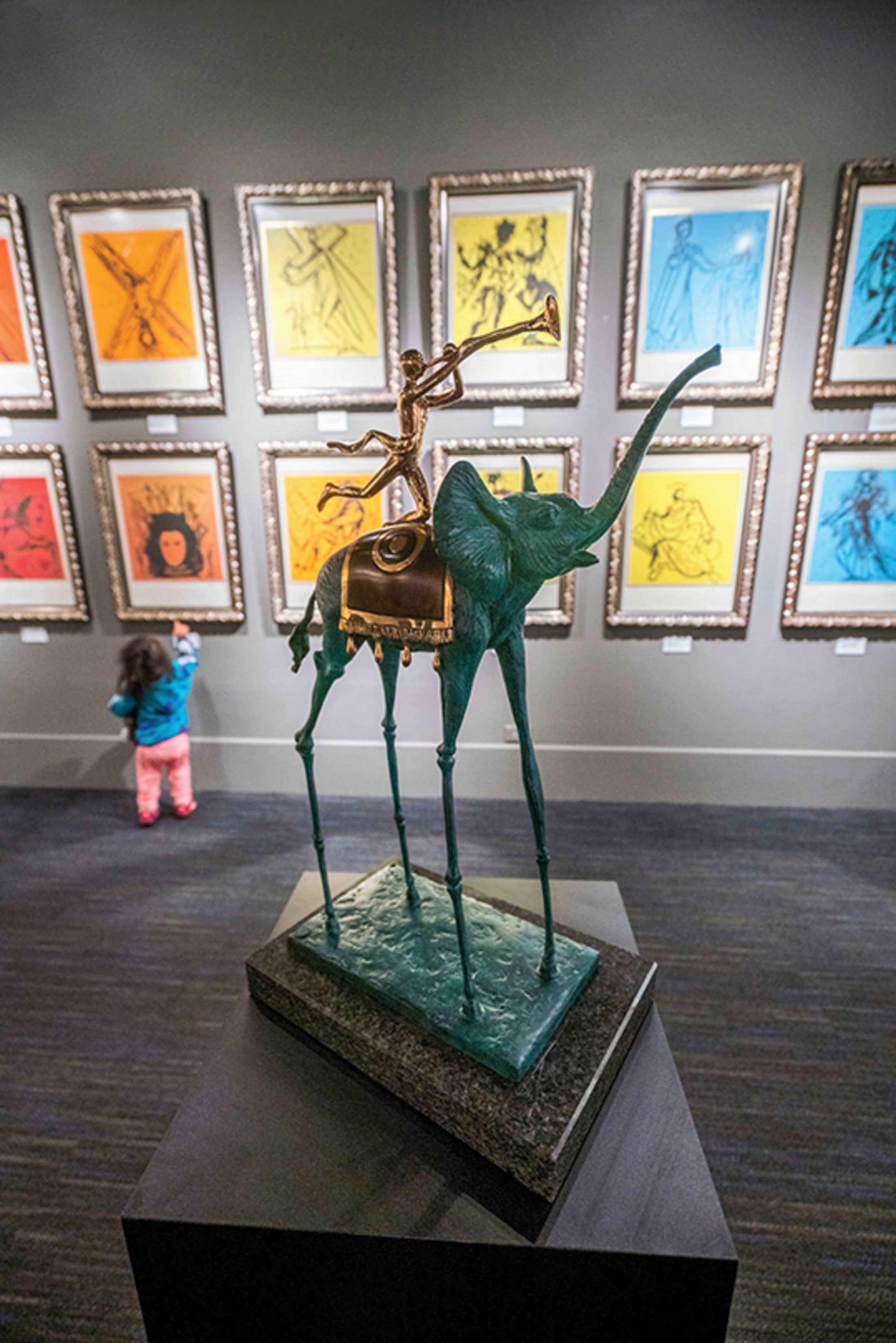 Salvador Dalí’s Triumphant Elephant sculpture and 12 Apostles series at the Custom House.
