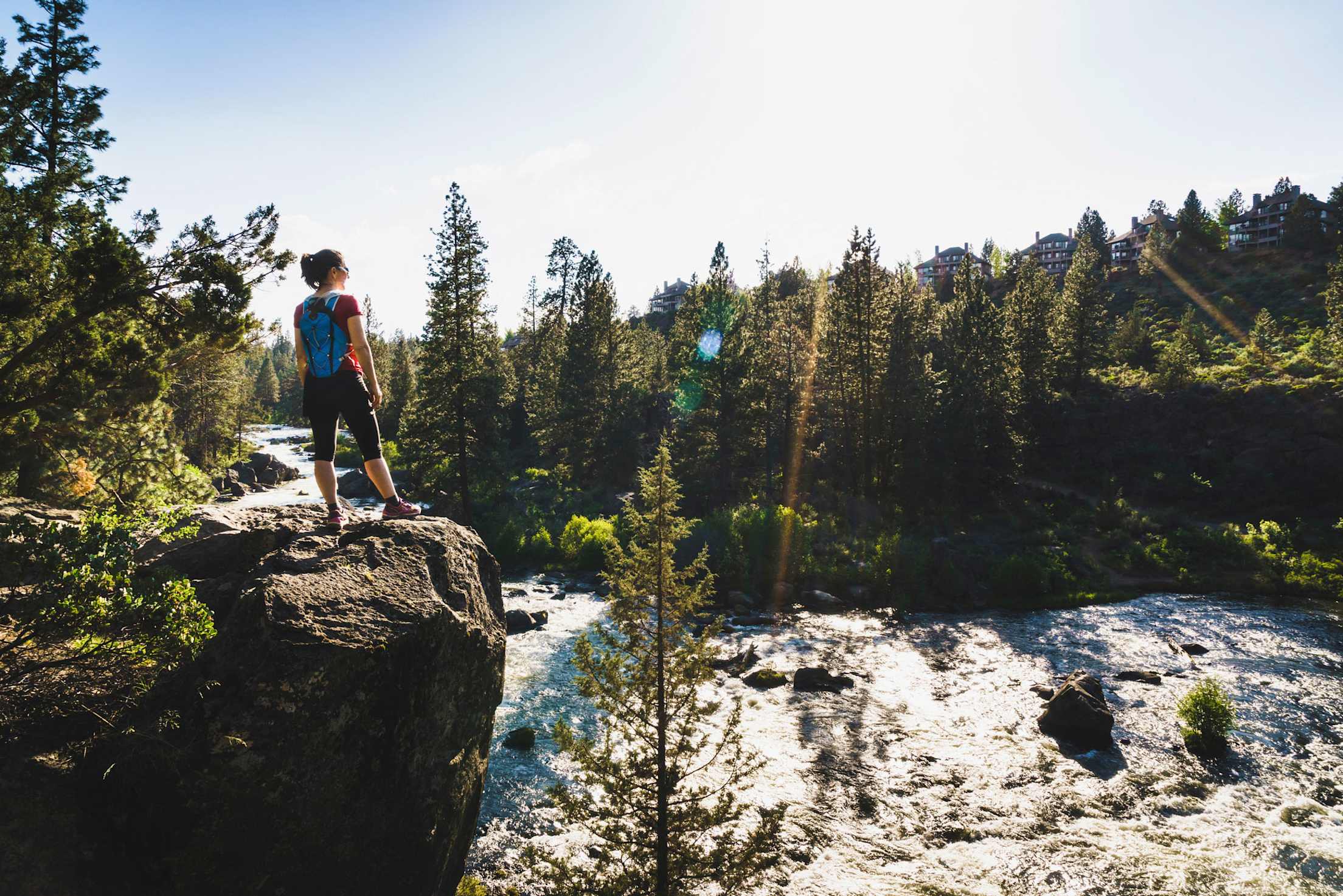 solo hiker on overlook above Deschutes River in Bend, Oregon