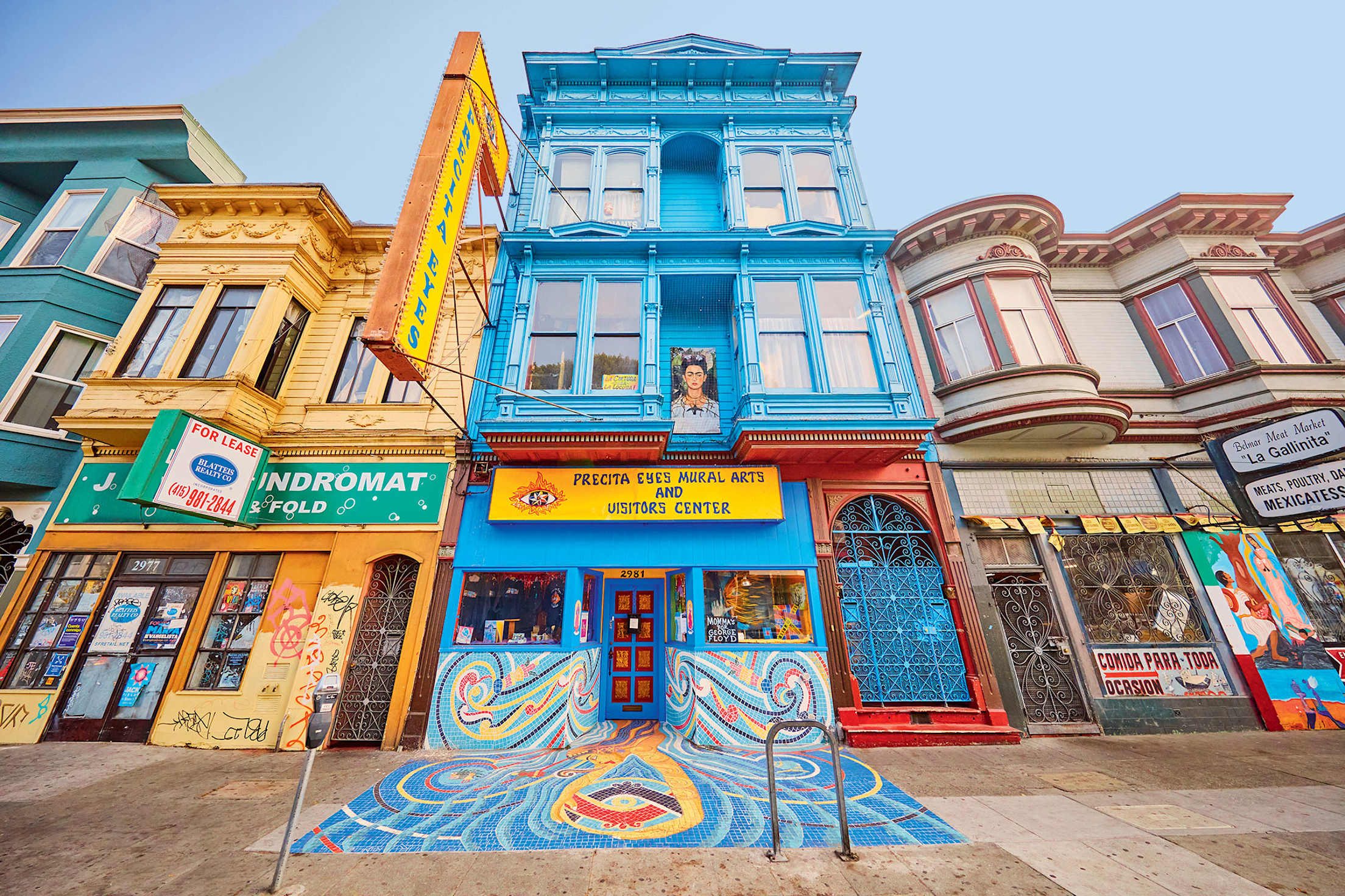 Precita Eyes Mural Arts & Visitors Center and its bright blue facade in San Francisco's Mission District