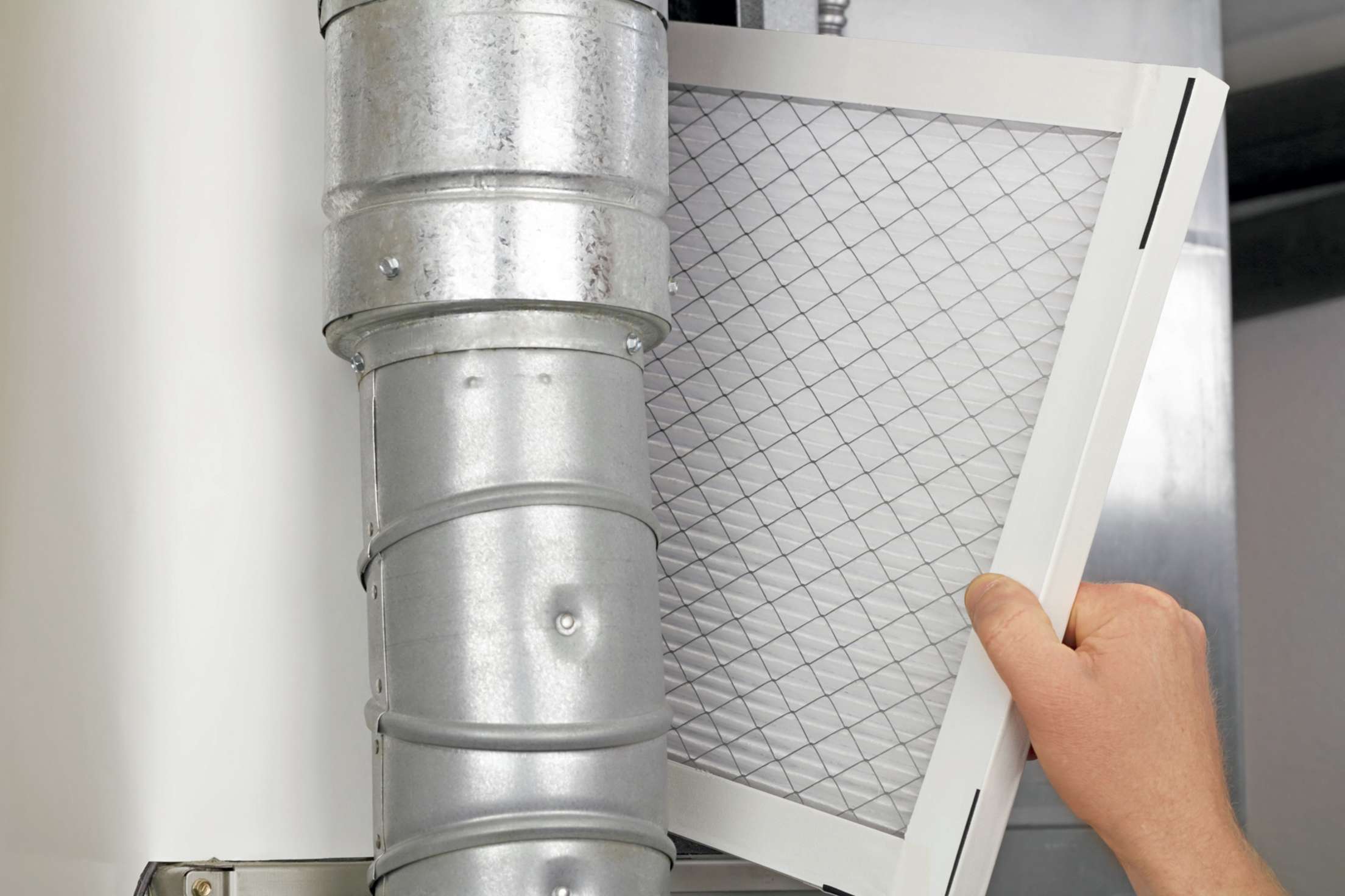 AAA Member replace air filter on their heater.