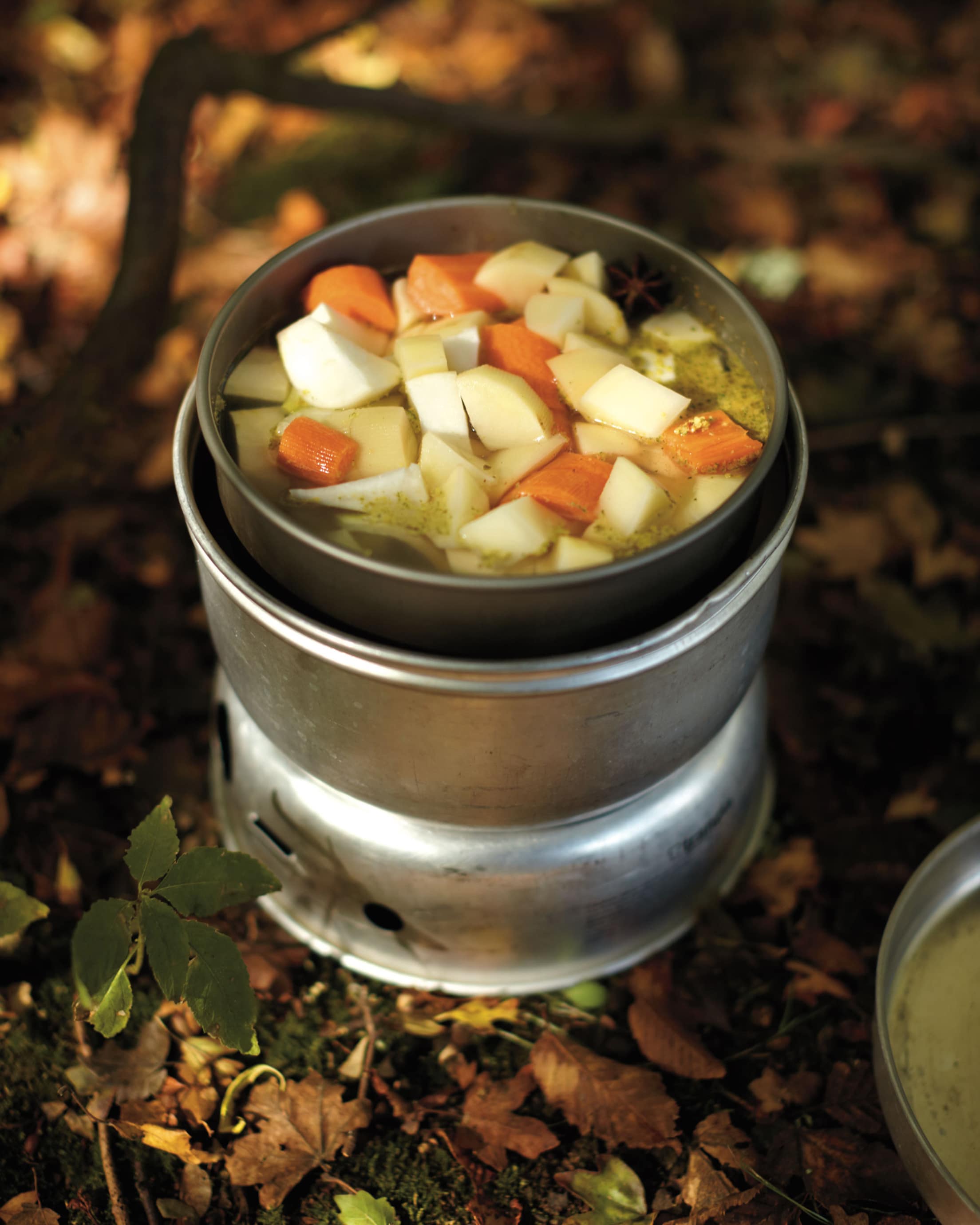 Nakkisoppa sausage soup in a campstove.