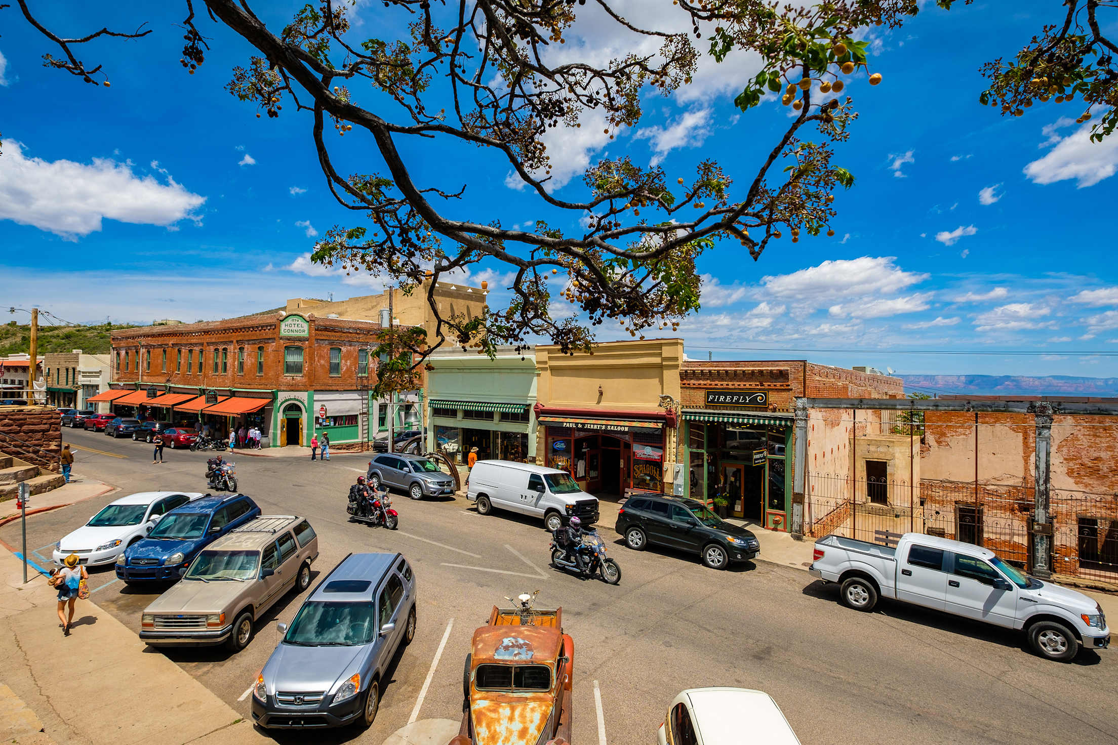 Cars parked on a historic street in downtown Jerome, Arizona.