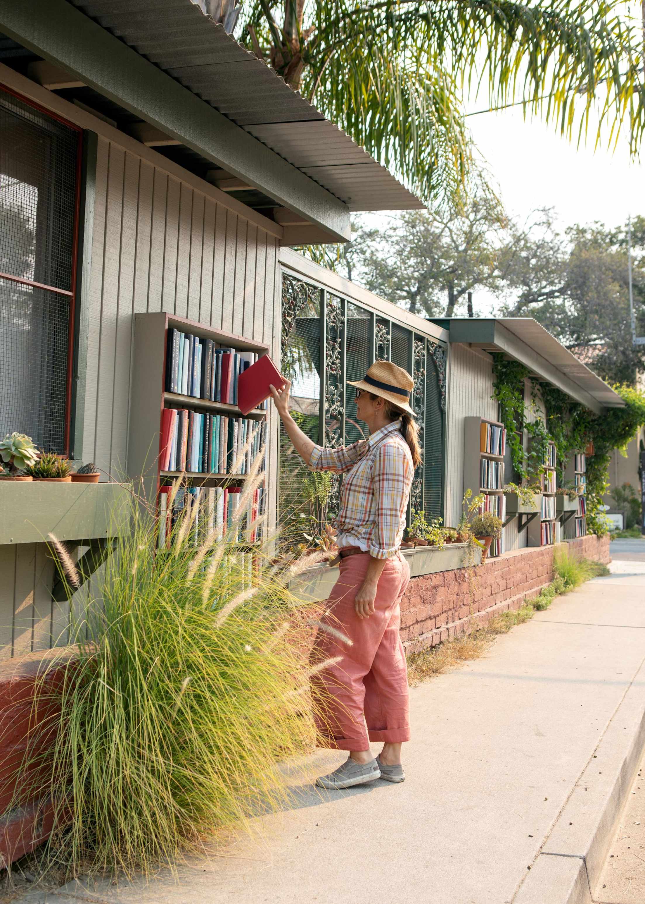 A person browses the outdoor shelves at Bart’s Books in Ojai, California.