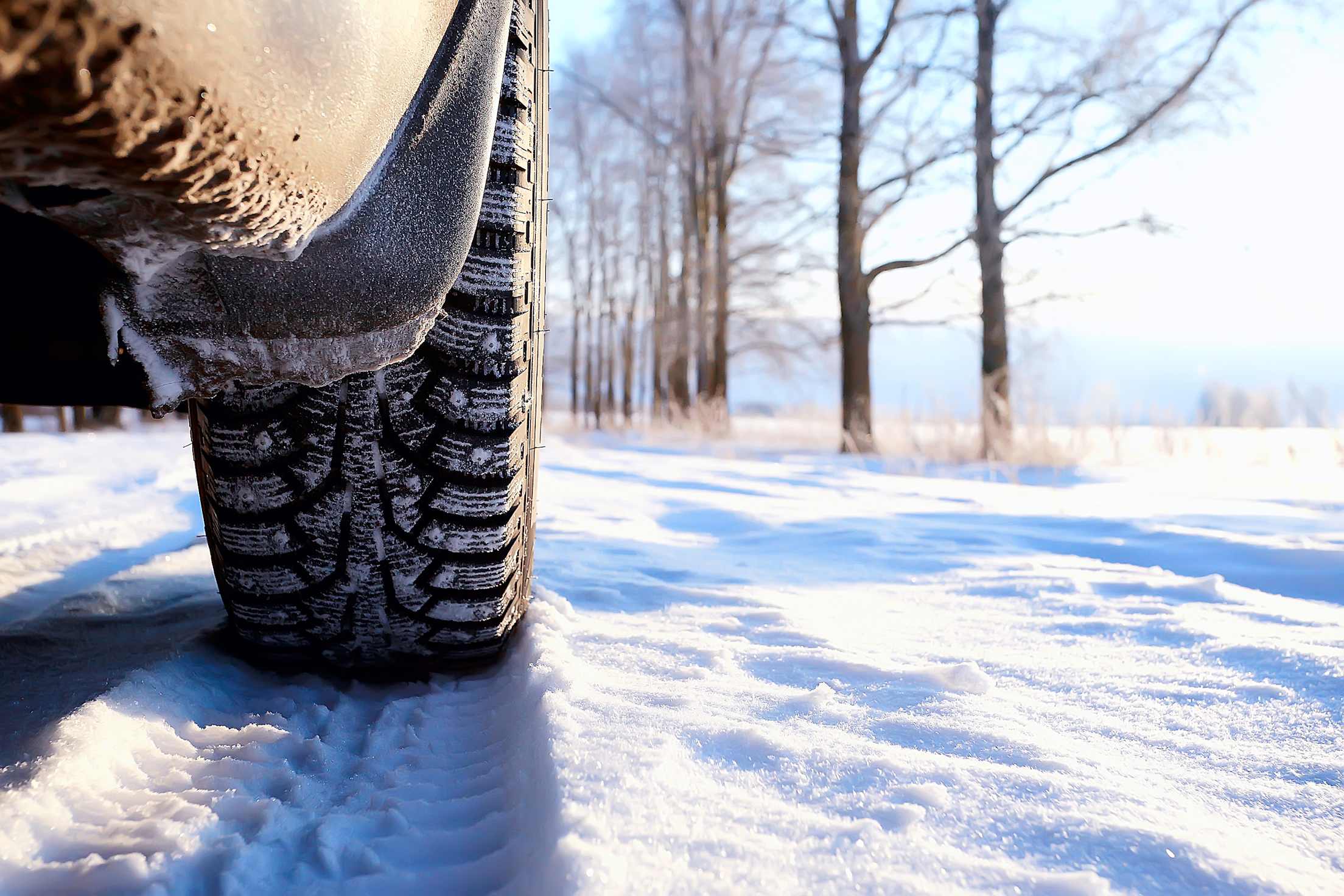 A tire on a snowy road.