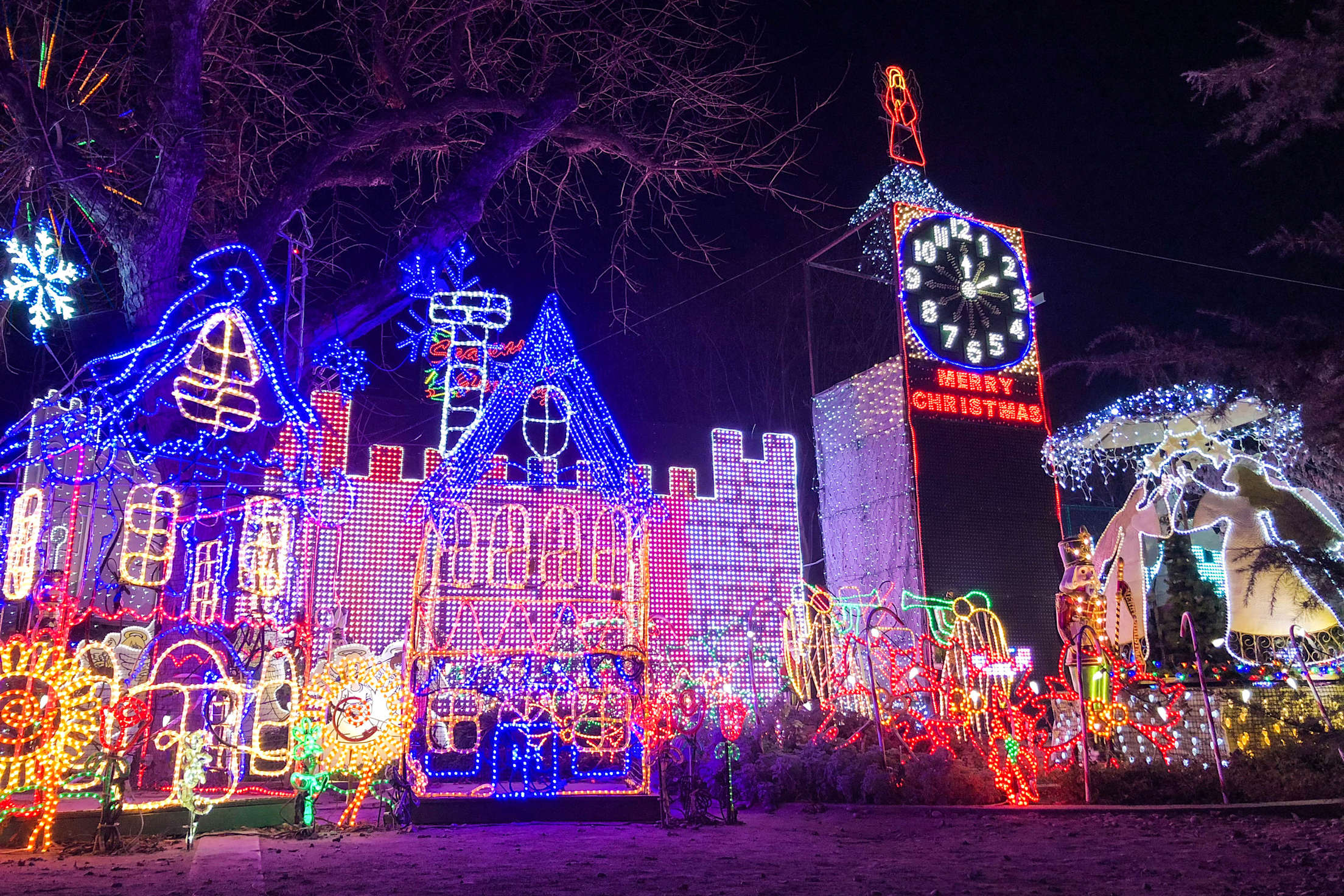 Village light display on Christmas Tree Lane in Fresno, California.