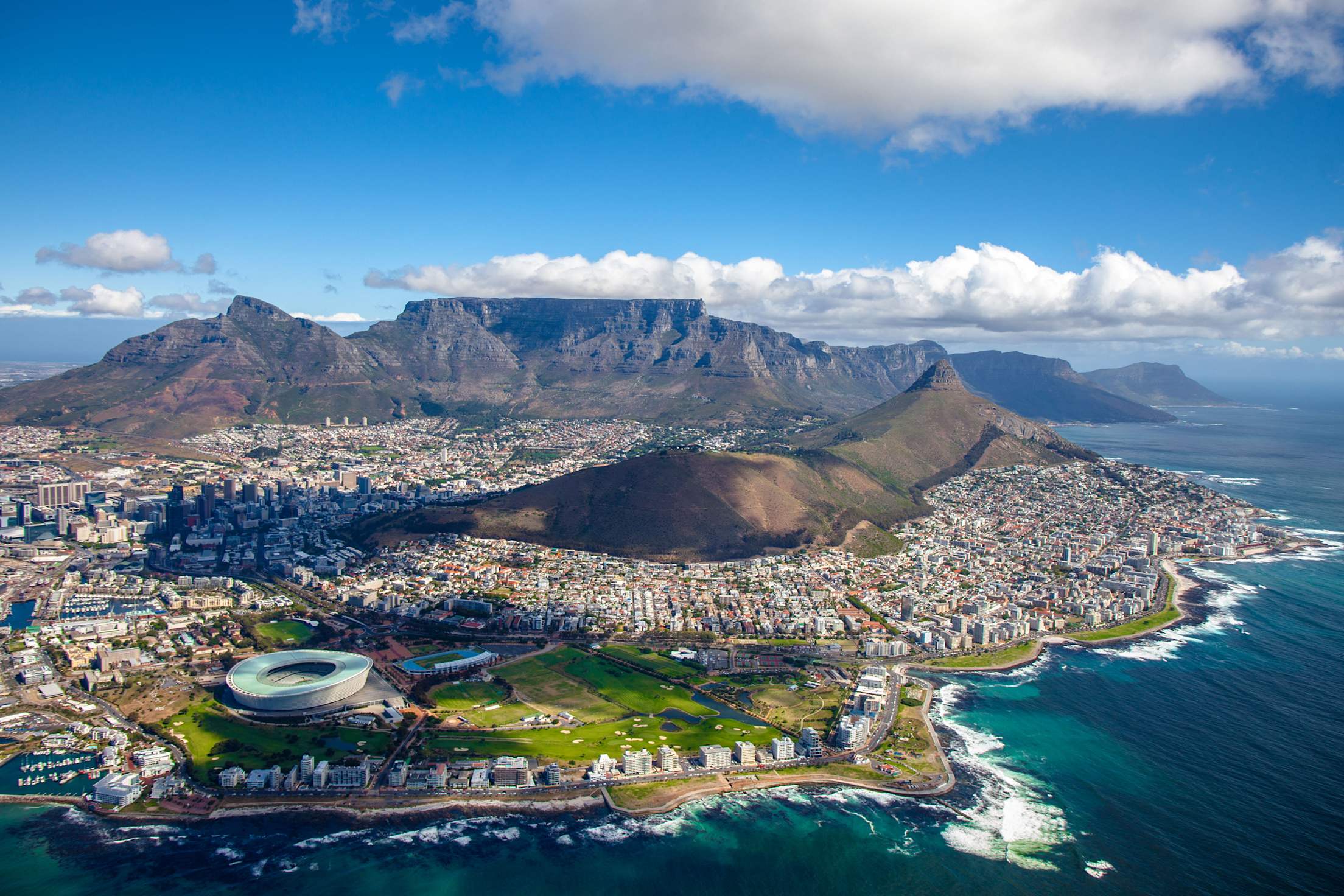 an aerial view of Cape Town, South Africa, with Table Mountain in the background, picture