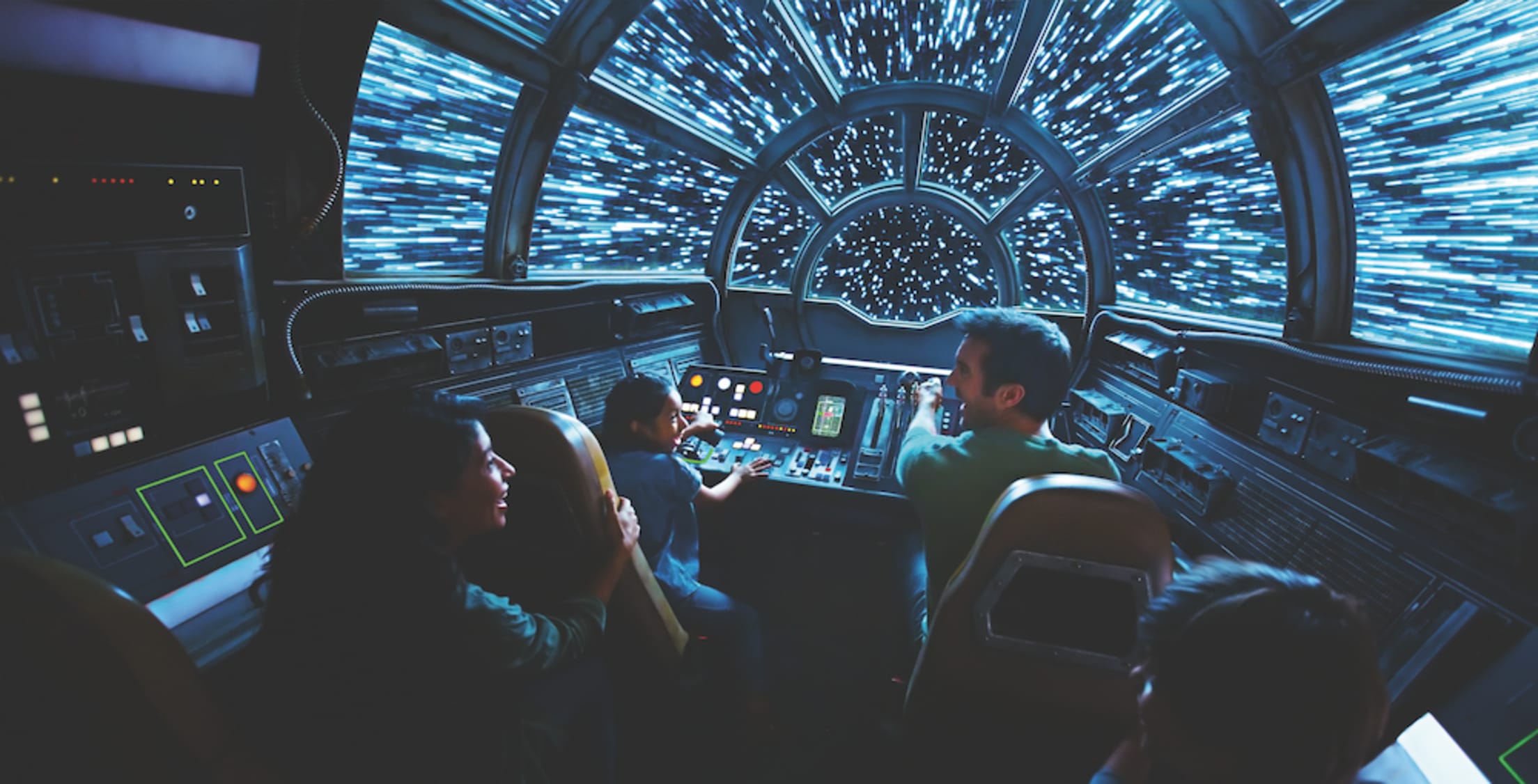 picture of a family in the cockpit on Millennium Falcon: Smuggler's Run at Star Wars: Galaxy's Edge