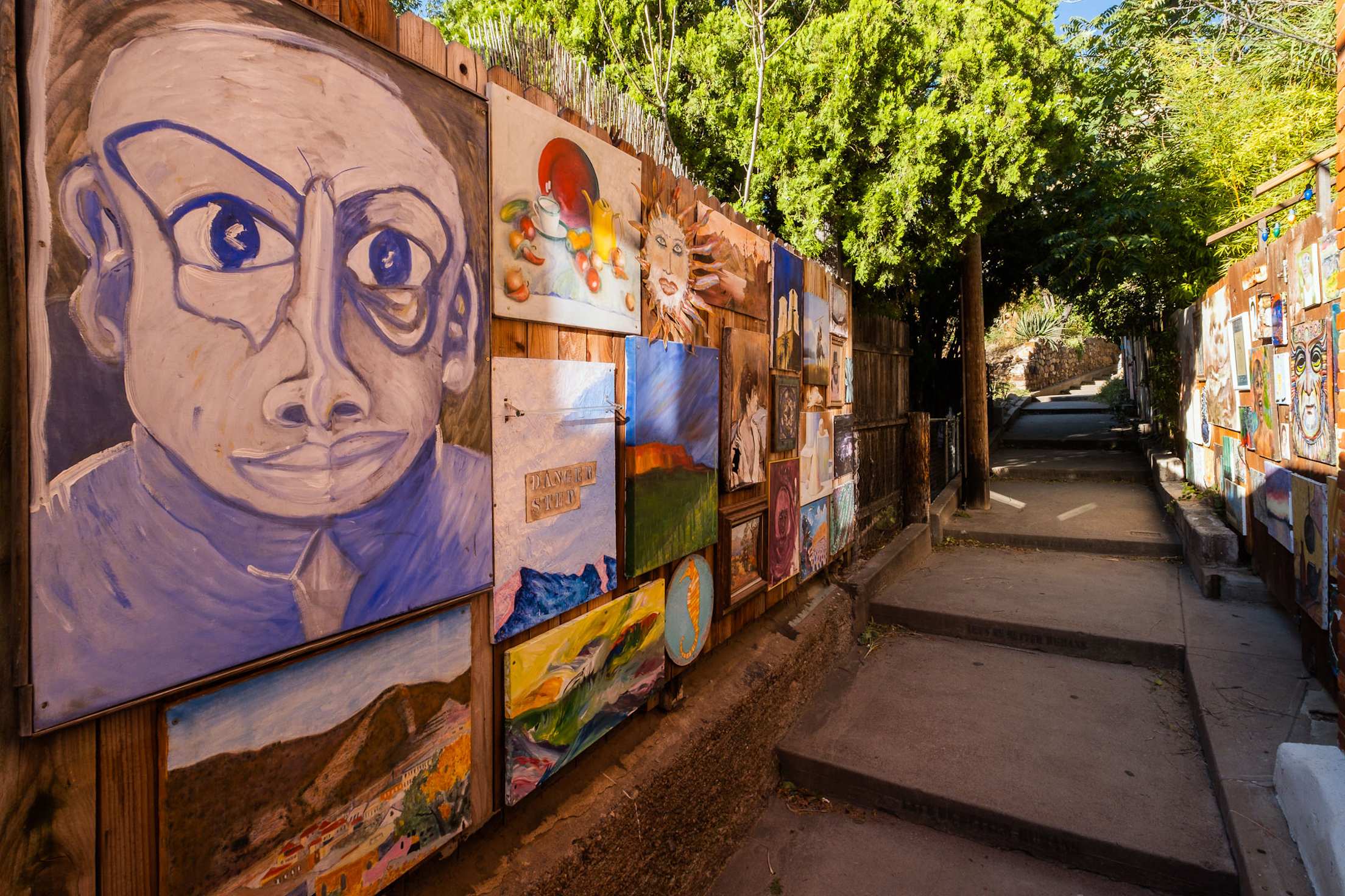 Art lines the walls of the Broadway Stairs in Bisbee, Arizona.
