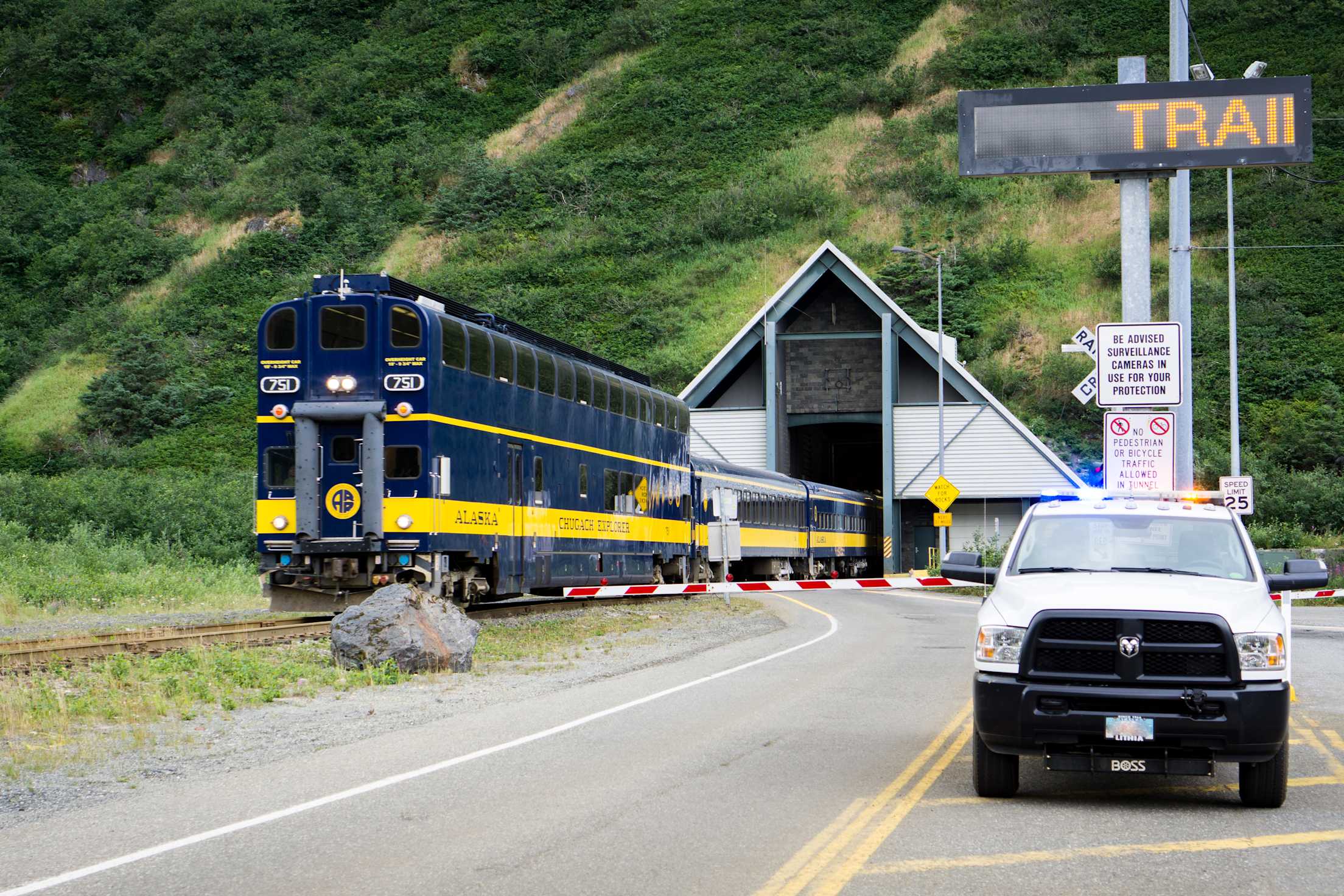 A train exits the Anton Anderson Memorial Tunnel in Whittier, Alaska.
