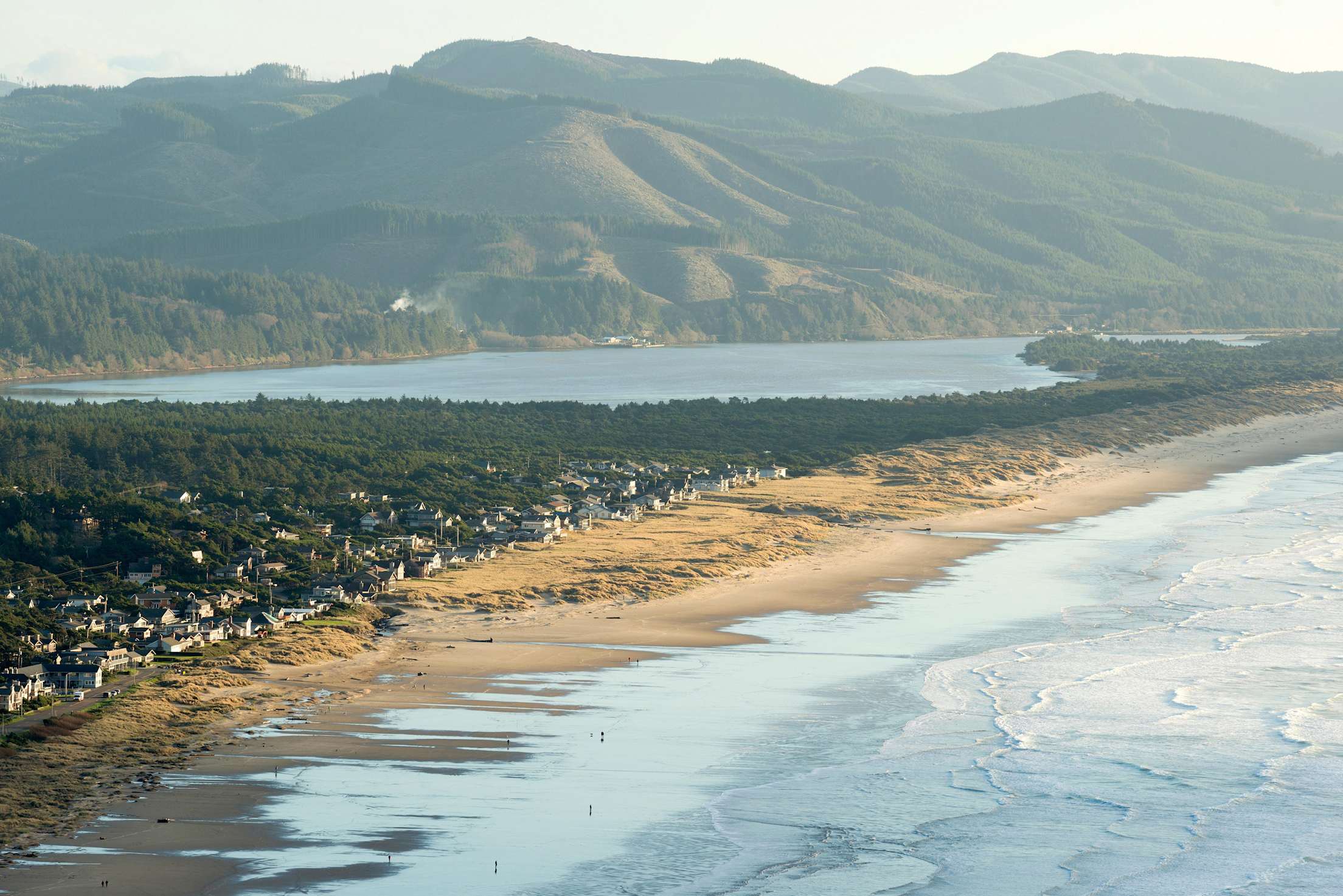 Aerial view of Manzanita, Oregon, Nehalem Bay, and the Pacific Coast.