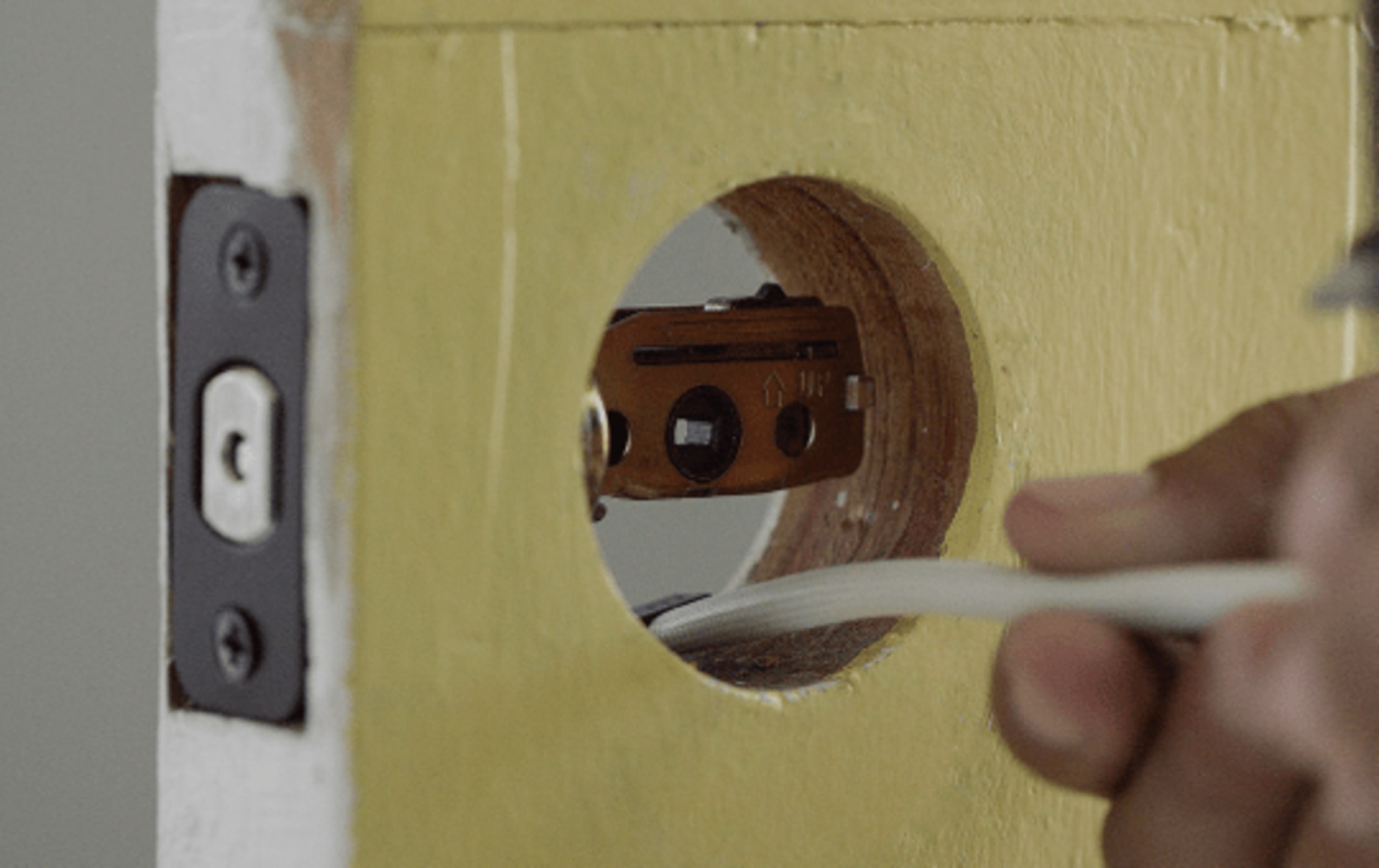 Feeding wire through door hole