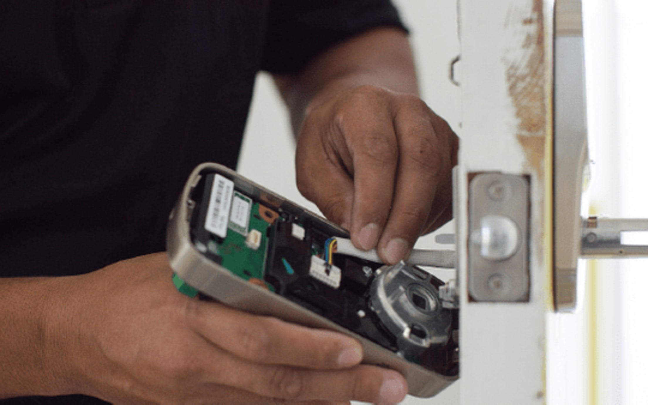 Connect the cable to the adaptor, located on the inside of the interior lock.