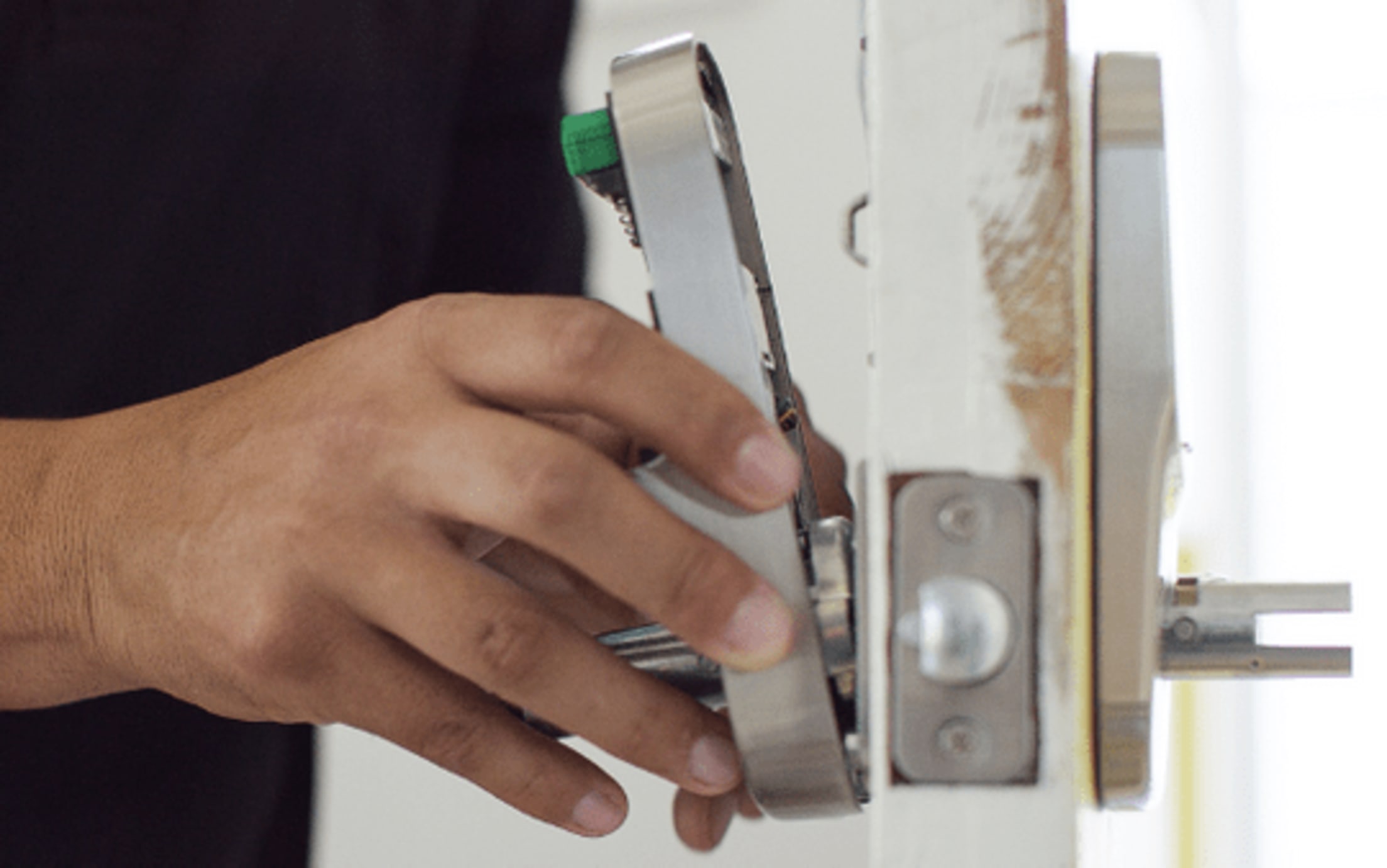 attach the interior lock to the mounting plate