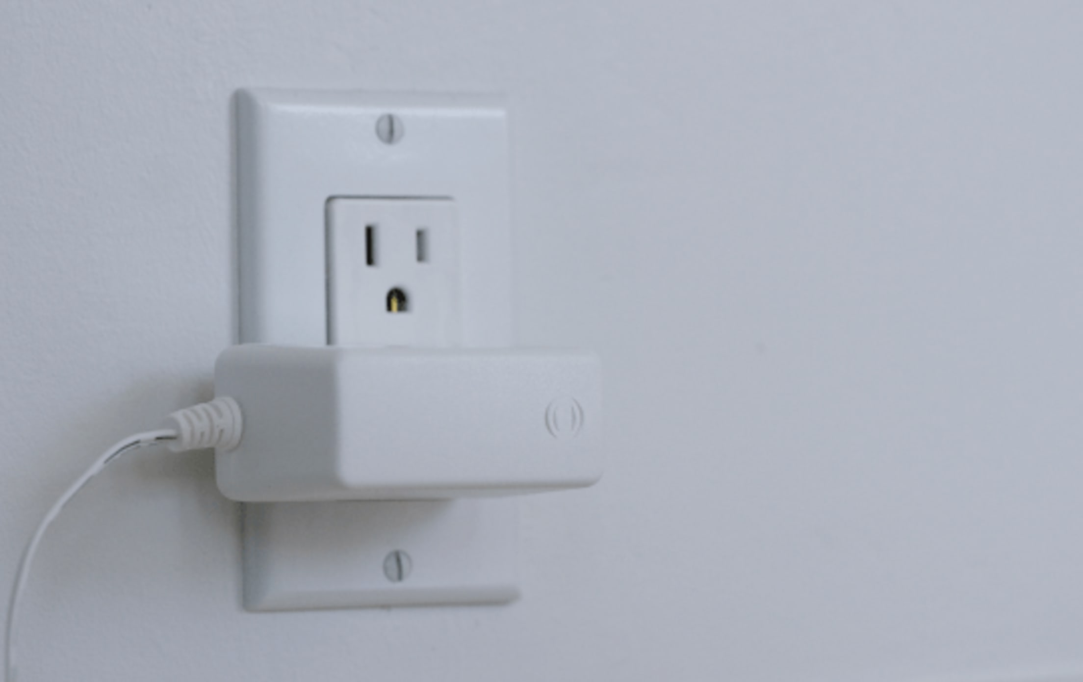 Power adaptor plugged to outlet