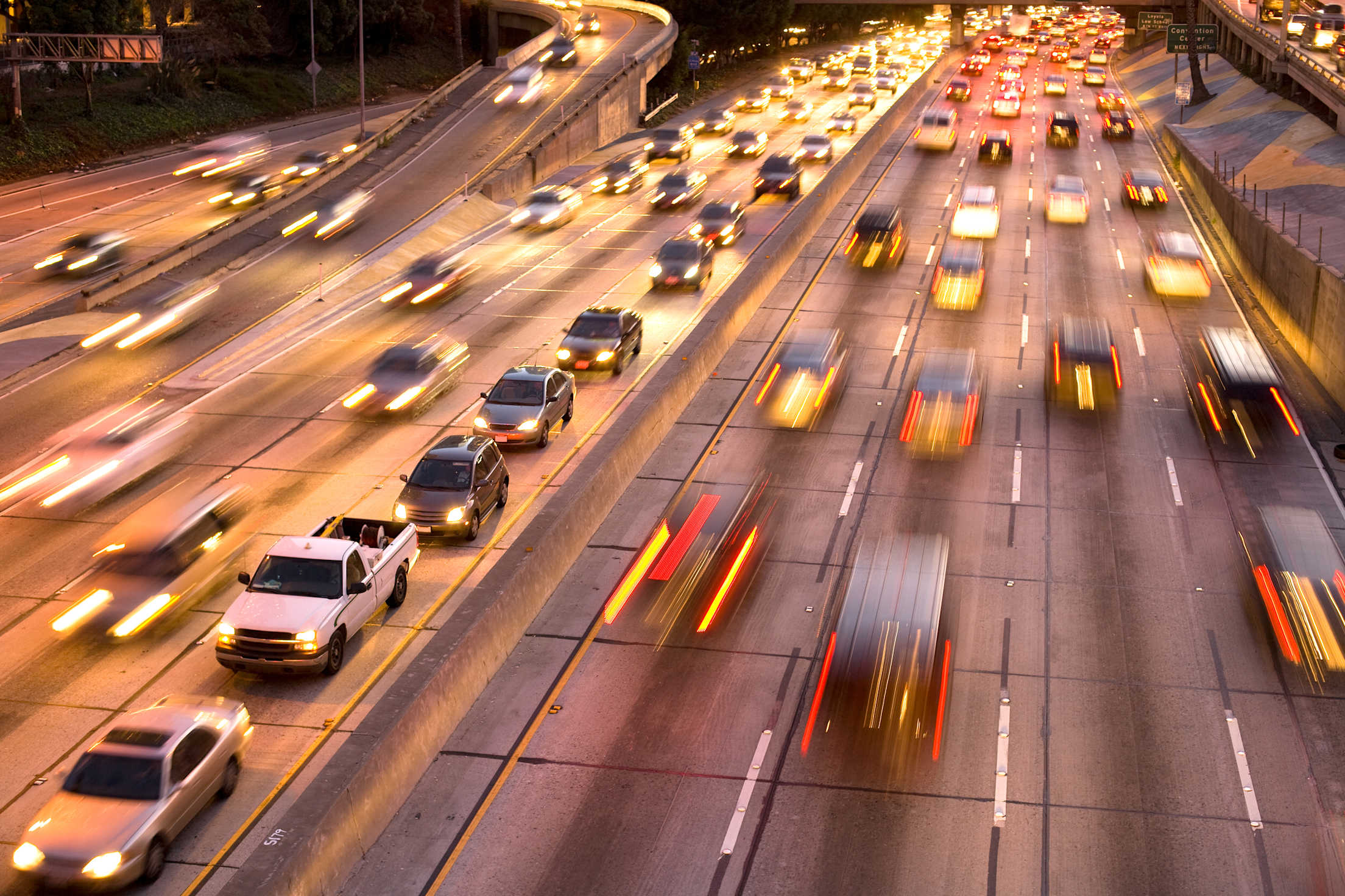 Cars drive on the highway in Southern California.