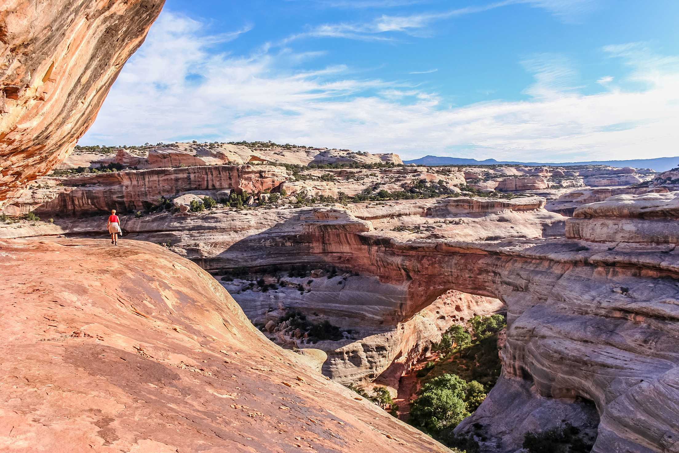 Woman hiking in Natural Bridges National Monument, Utah