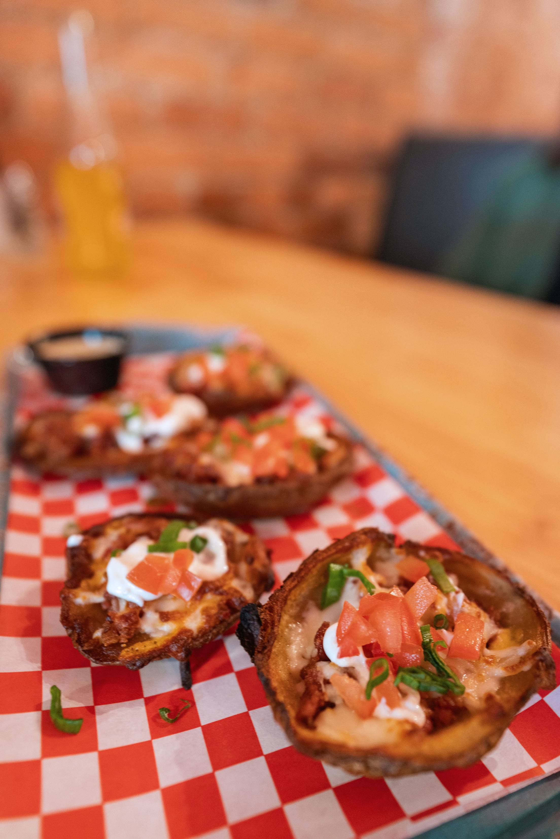 A savory lunch from JADAAs Kitchen in Downieville, loaded with cheese, bacon, tomatoes, and chives.