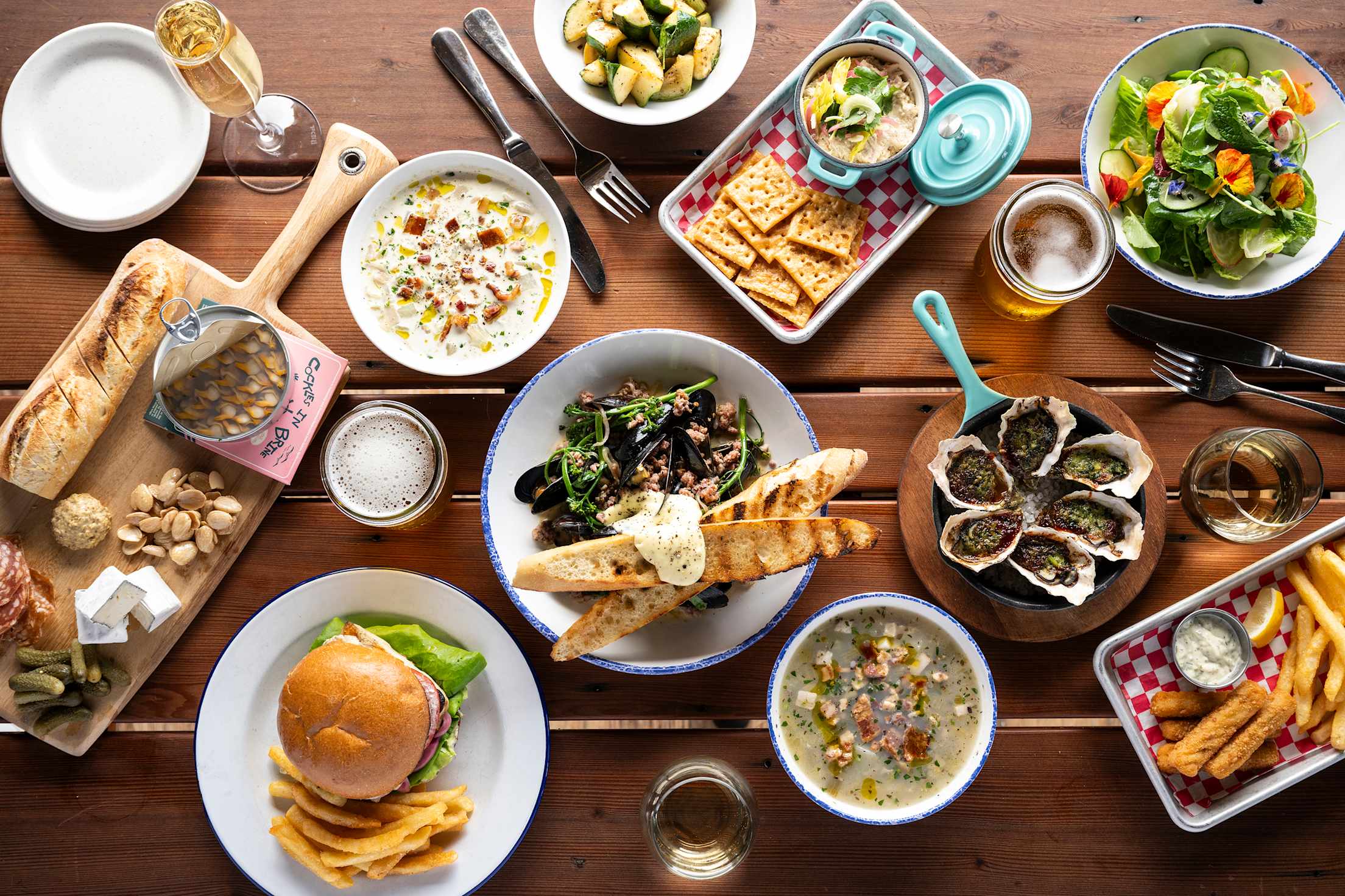 A full lunch spread on a table at Nicks' Cove in Marshall, California.