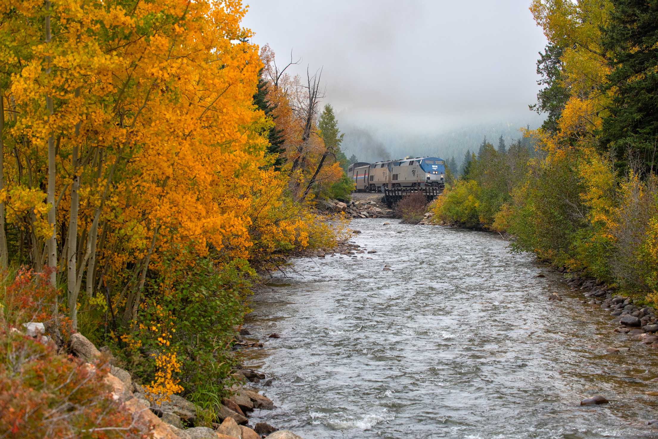 Amtrak Zephyr Train #5 barrels across South Boulder Creek at Pinecliffe, Colorado, on Union Pacific's Moffat Tunnel Subdivision.