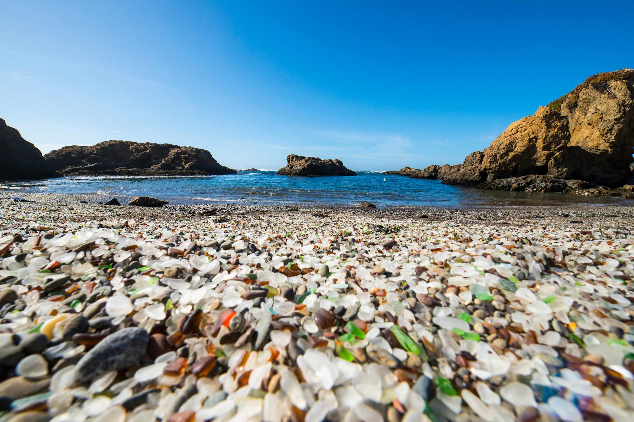 Glass-filled shoreline of Glass Beach in Fort Bragg, California