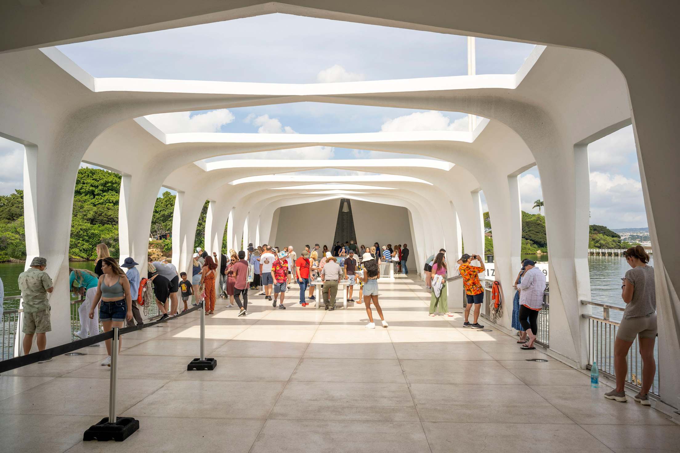 Visitors walk through Pearl Harbor's USS Arizona memorial on O‘ahu.