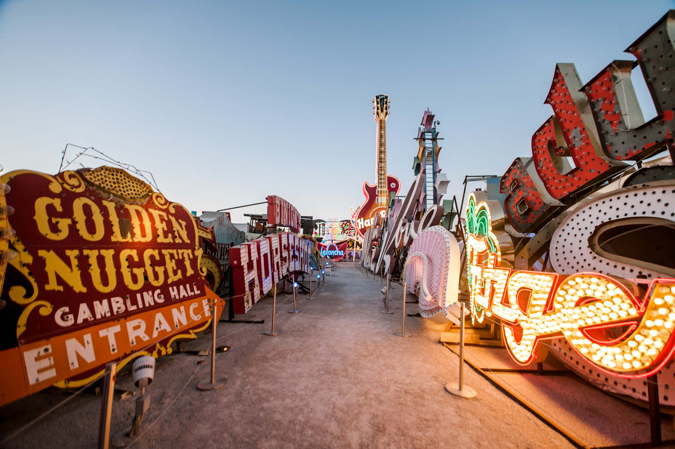Historic signs lit up at the Neon Museum in Las Vegas, Nevada.