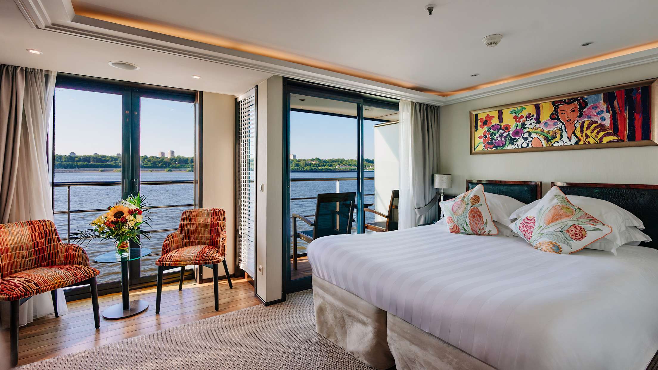 A cabin with balcony aboard the Ama Bella river cruise ship.