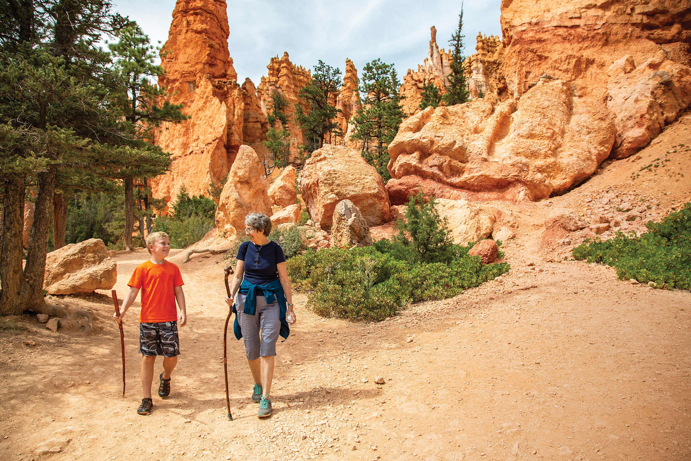 Woman and grandson hiking in Bryce Canyon National Park, Utah.