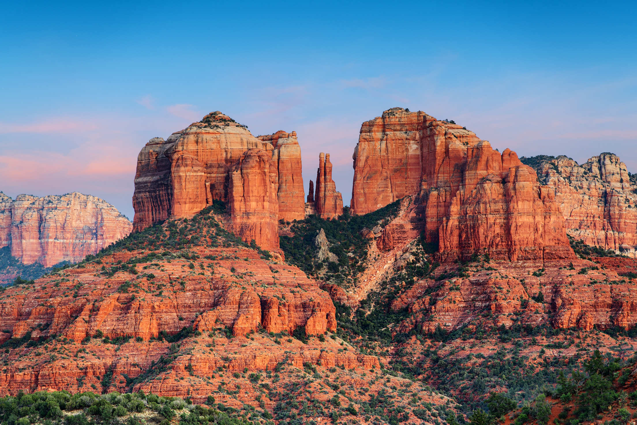 red rocks against a dramatic pink and blue sunset in Arizona