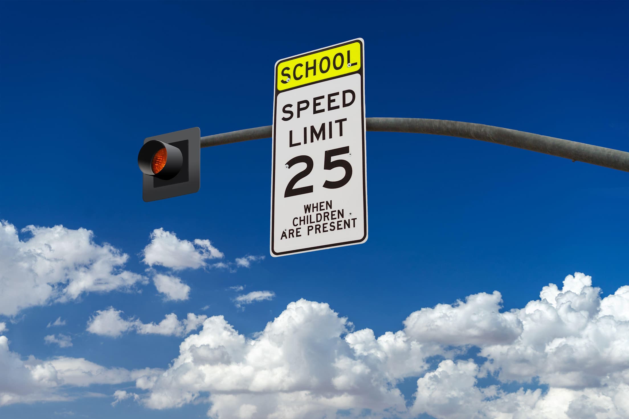 a street sign that reads 'school speed limit 25 when children are present'
