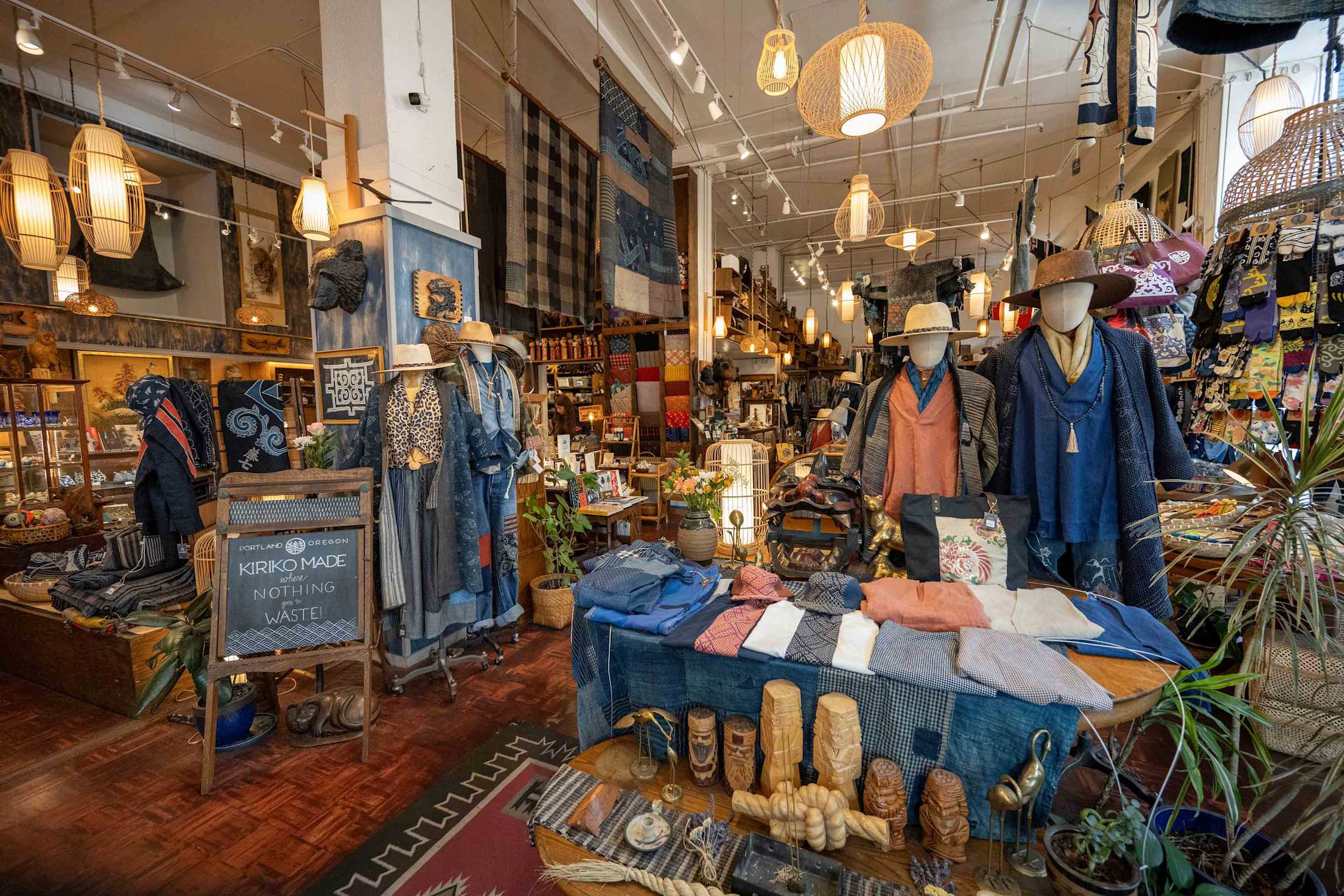 the interior of a store with beautiful Japanese textiles and clothes for sale